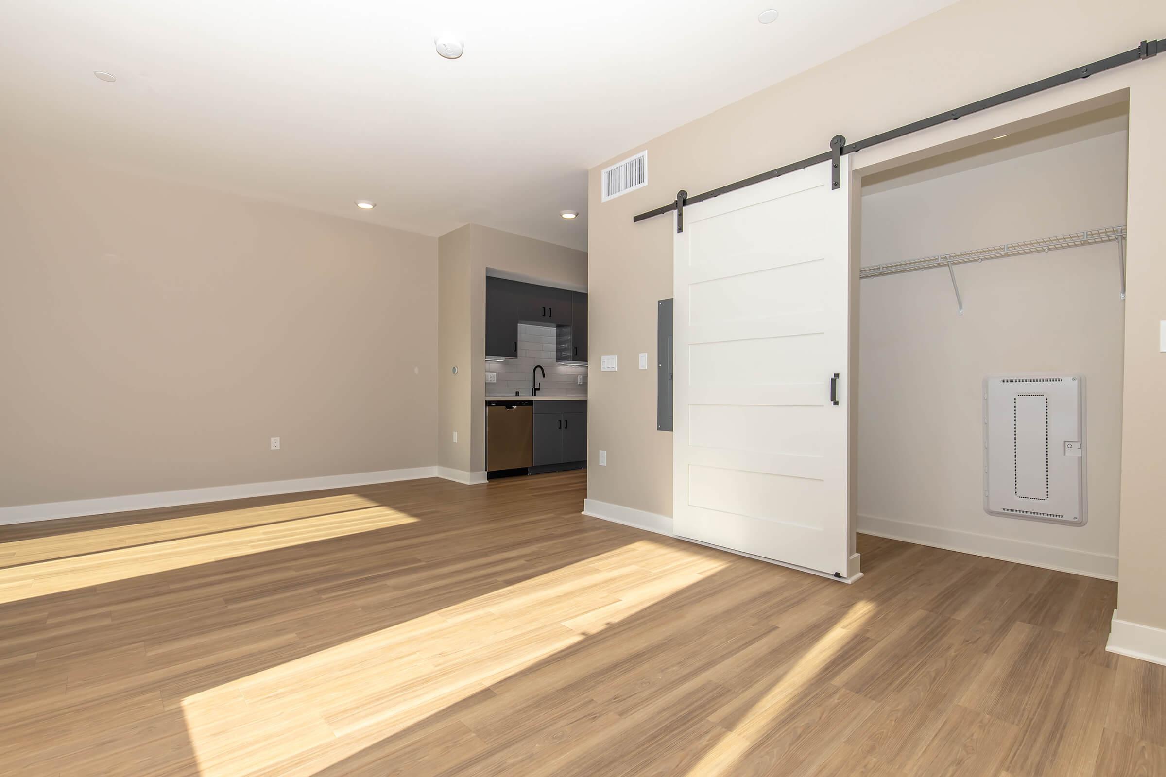 a kitchen with a wood floor