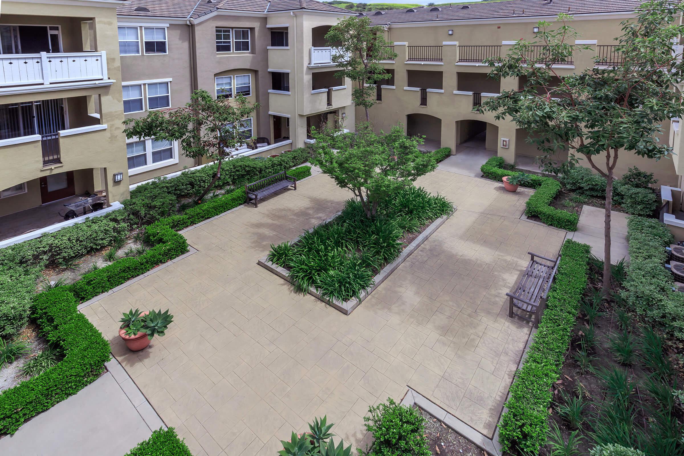 Laurel Terrace Apartment Homes courtyard with green landscaping