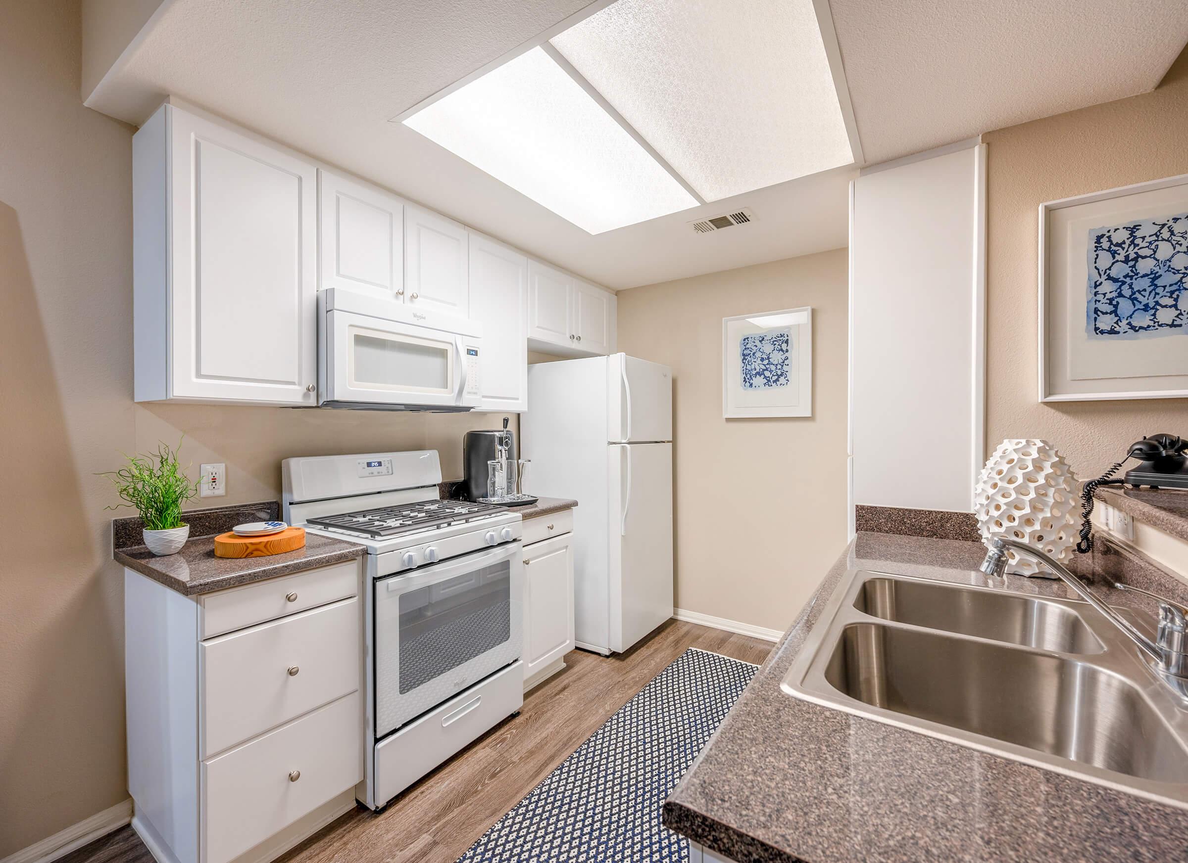 Laurel Terrace Apartment Homes provides custom white cabinetry