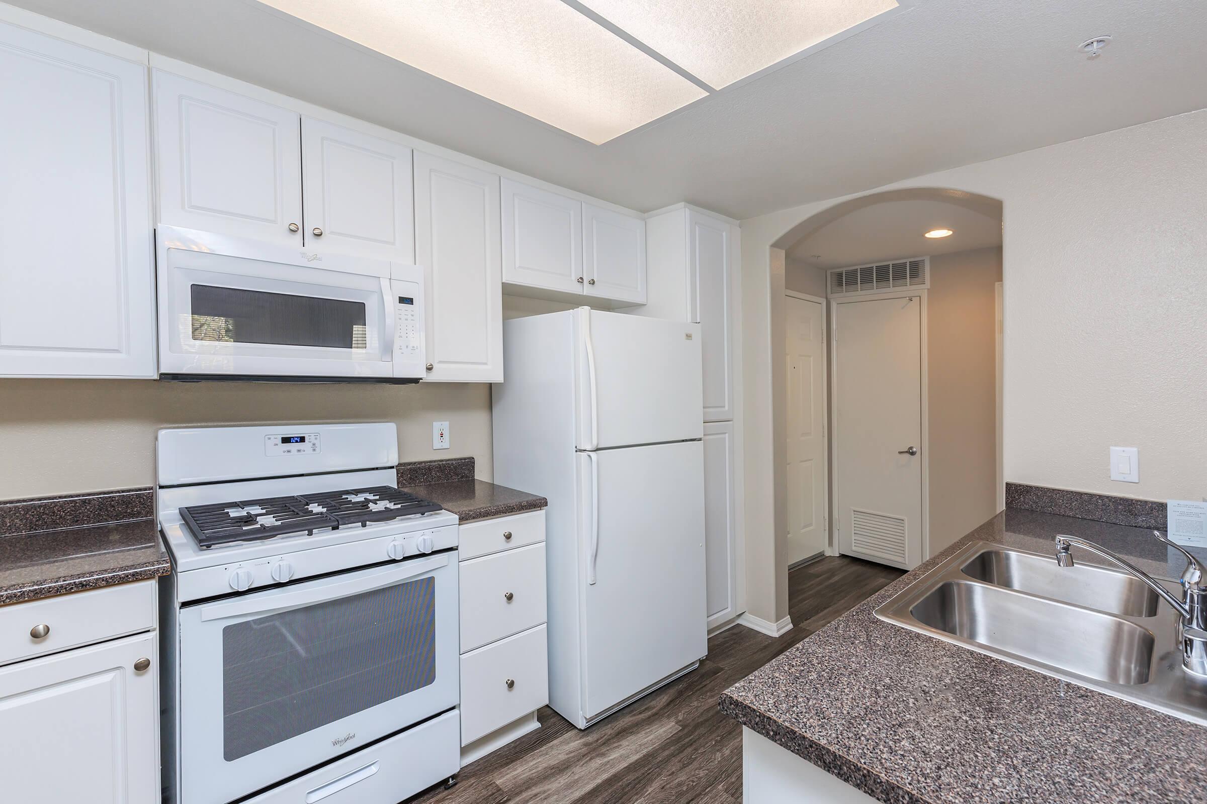 Fully-equipped kitchen provided at Laurel Terrace Apartment Homes