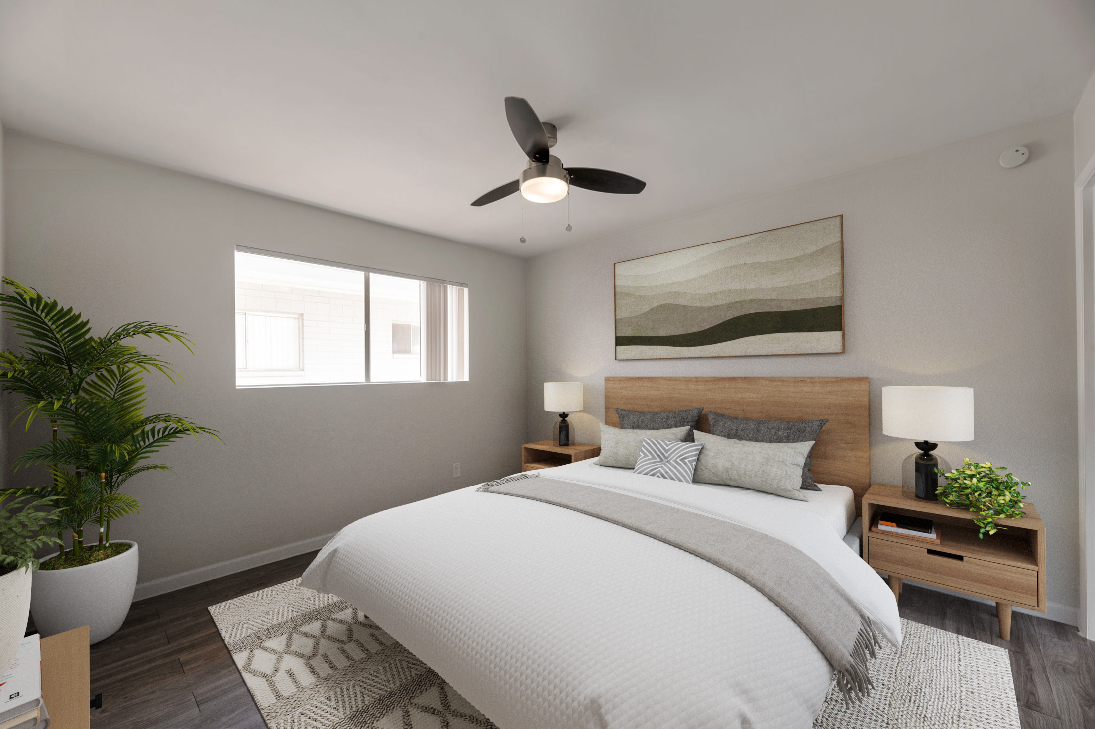 A cozy bedroom featuring a neatly made bed with a light gray throw blanket and decorative pillows. There are two bedside lamps on wooden nightstands, a green plant in the corner, and a large window allowing natural light. A textured wall art piece hangs above the bed, adding a touch of style to the neutral decor.