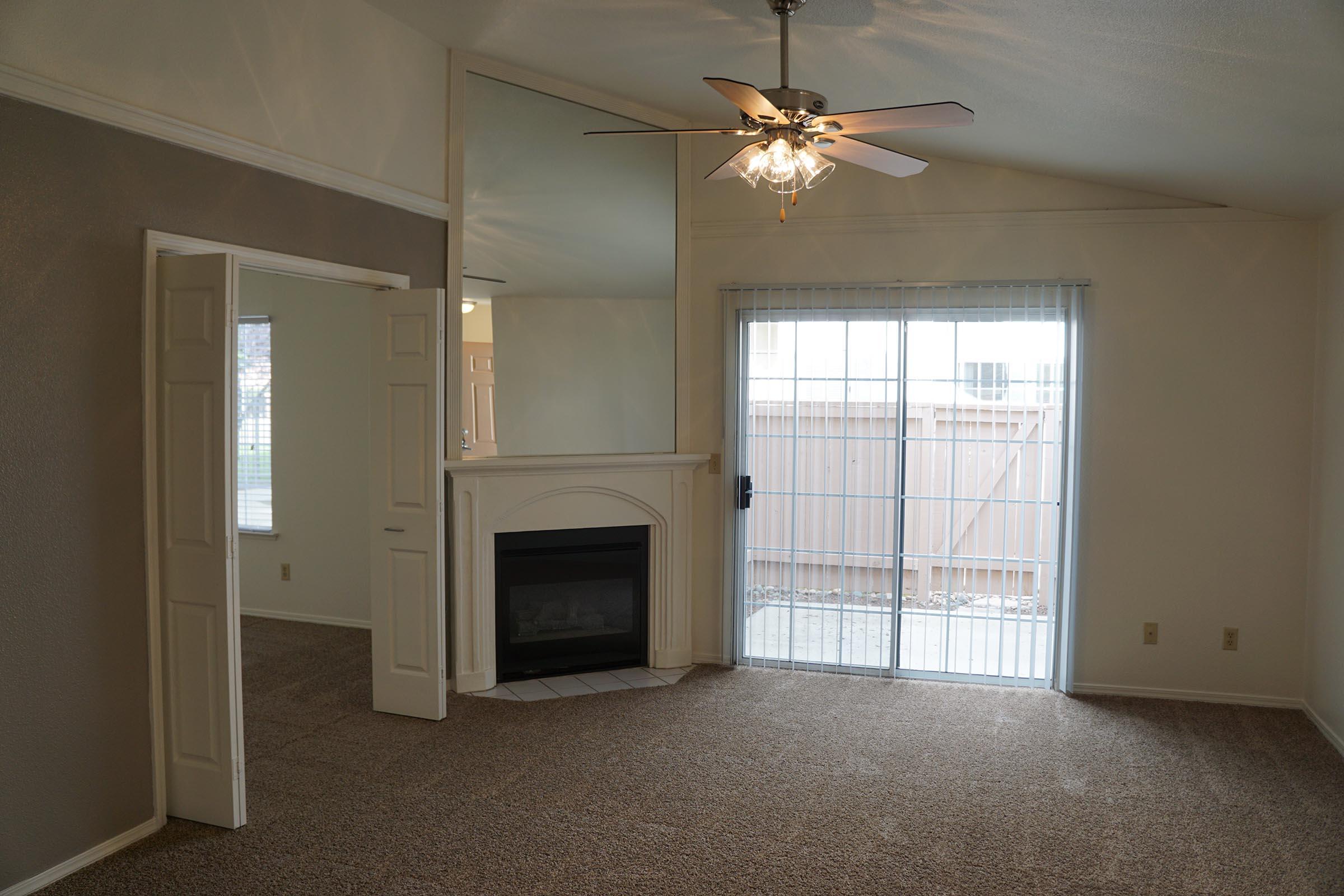 a view of a living room with a large window