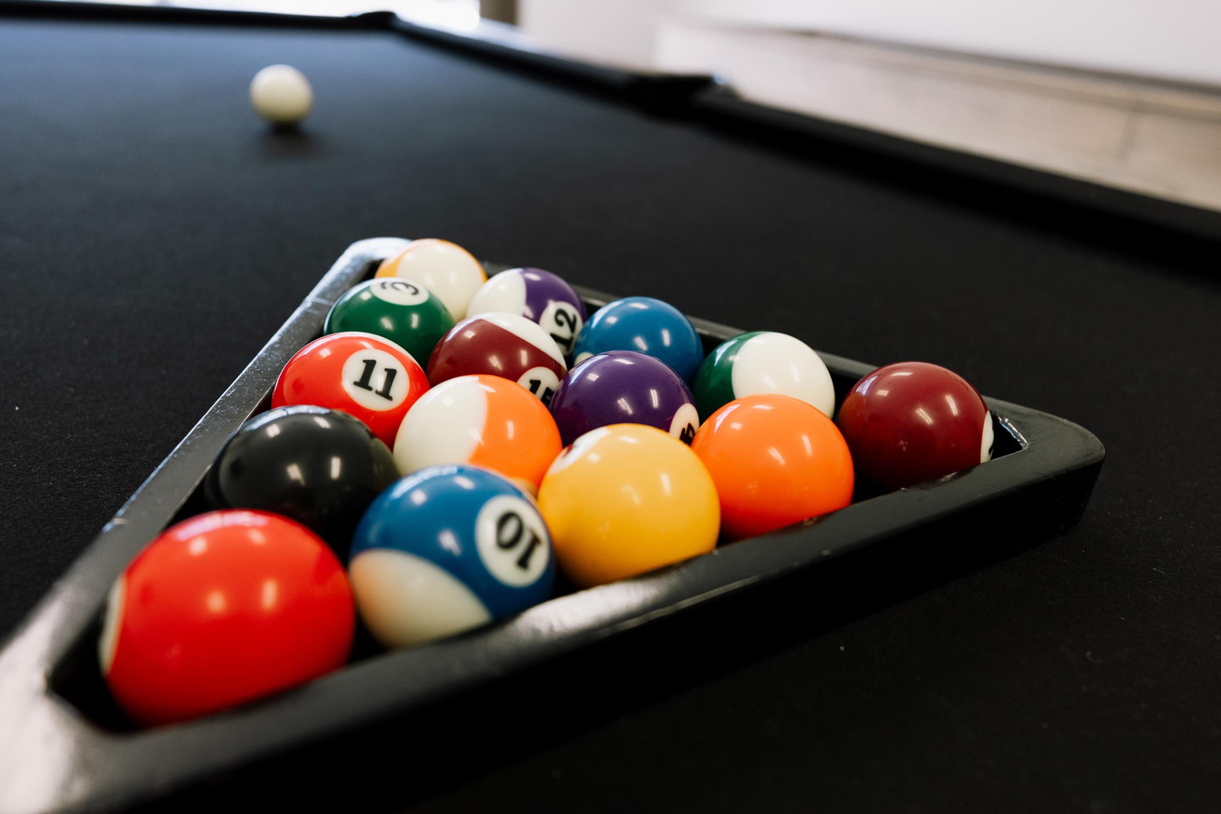 a table with a ball in a room