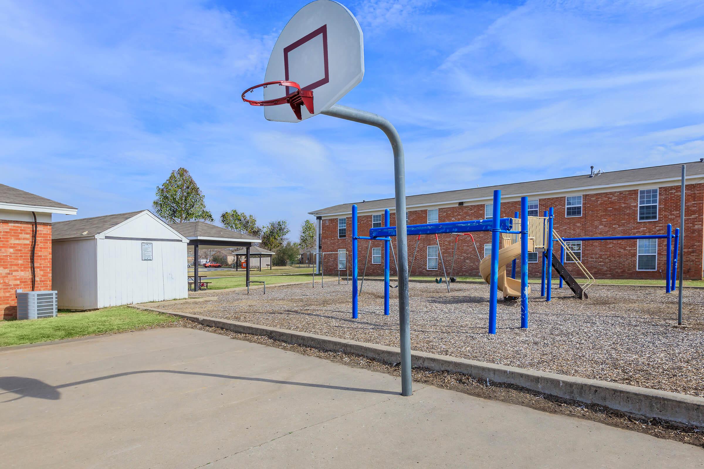 a basketball hoop on the side of a building