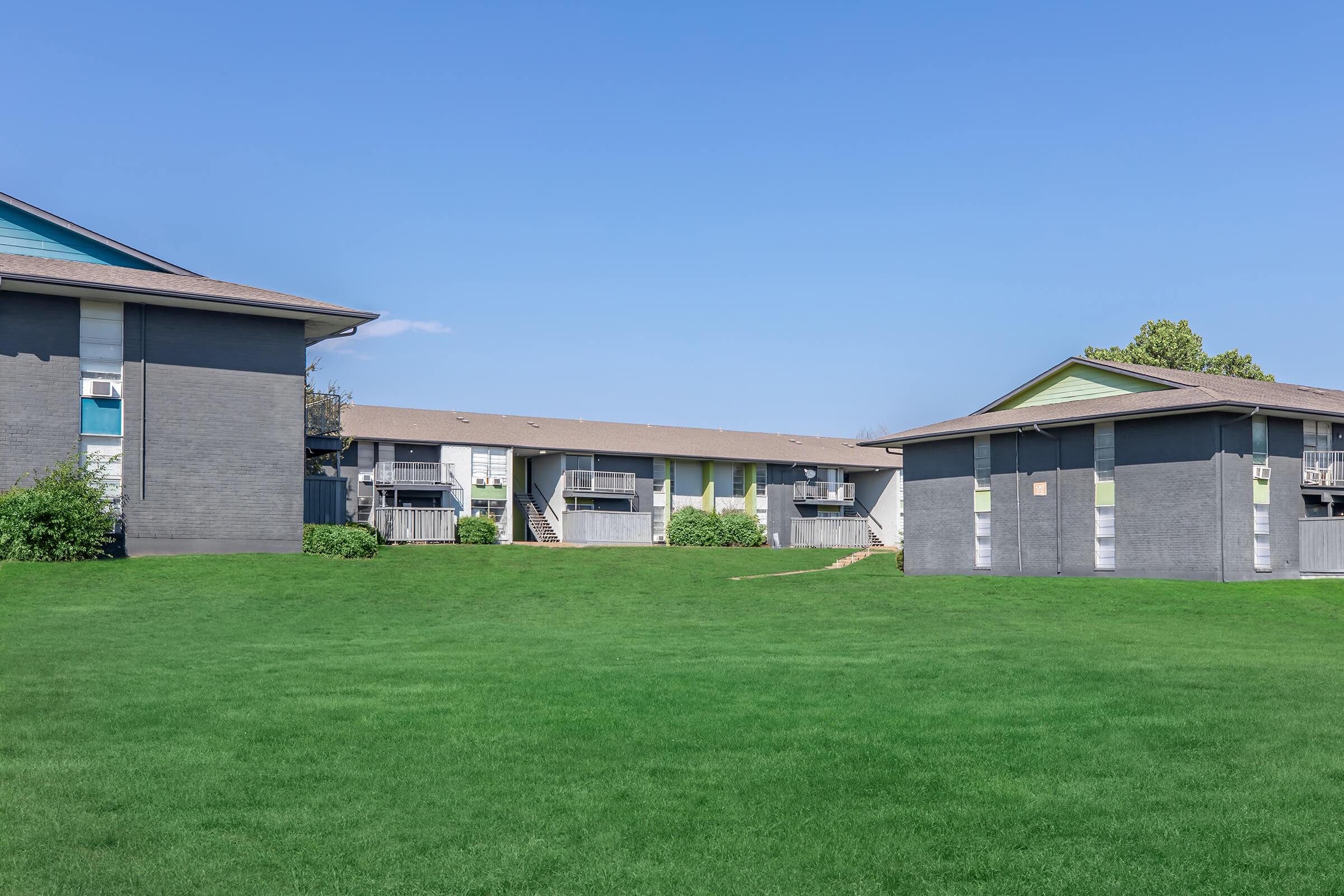 a large lawn in front of a house