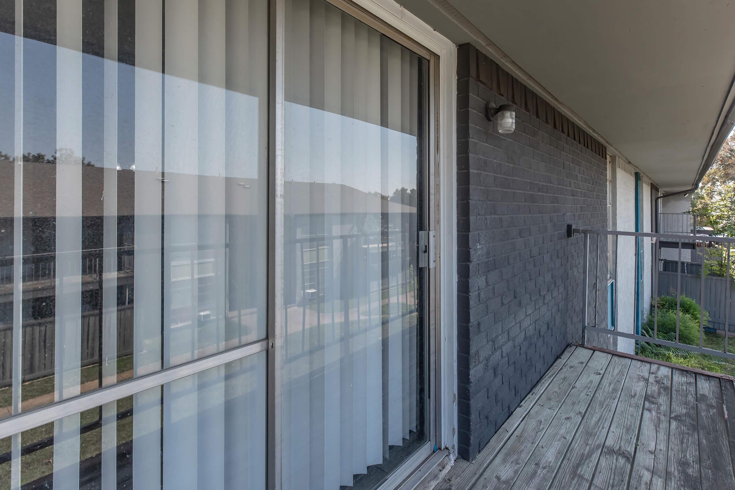 a glass door on the side of a building