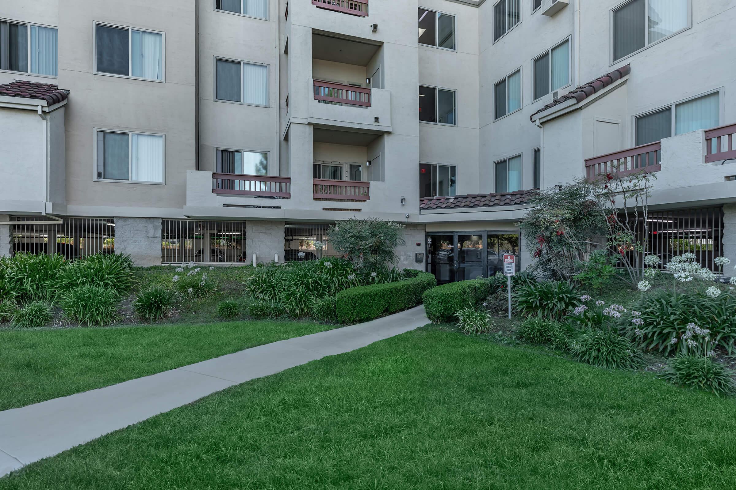 a large lawn in front of a building