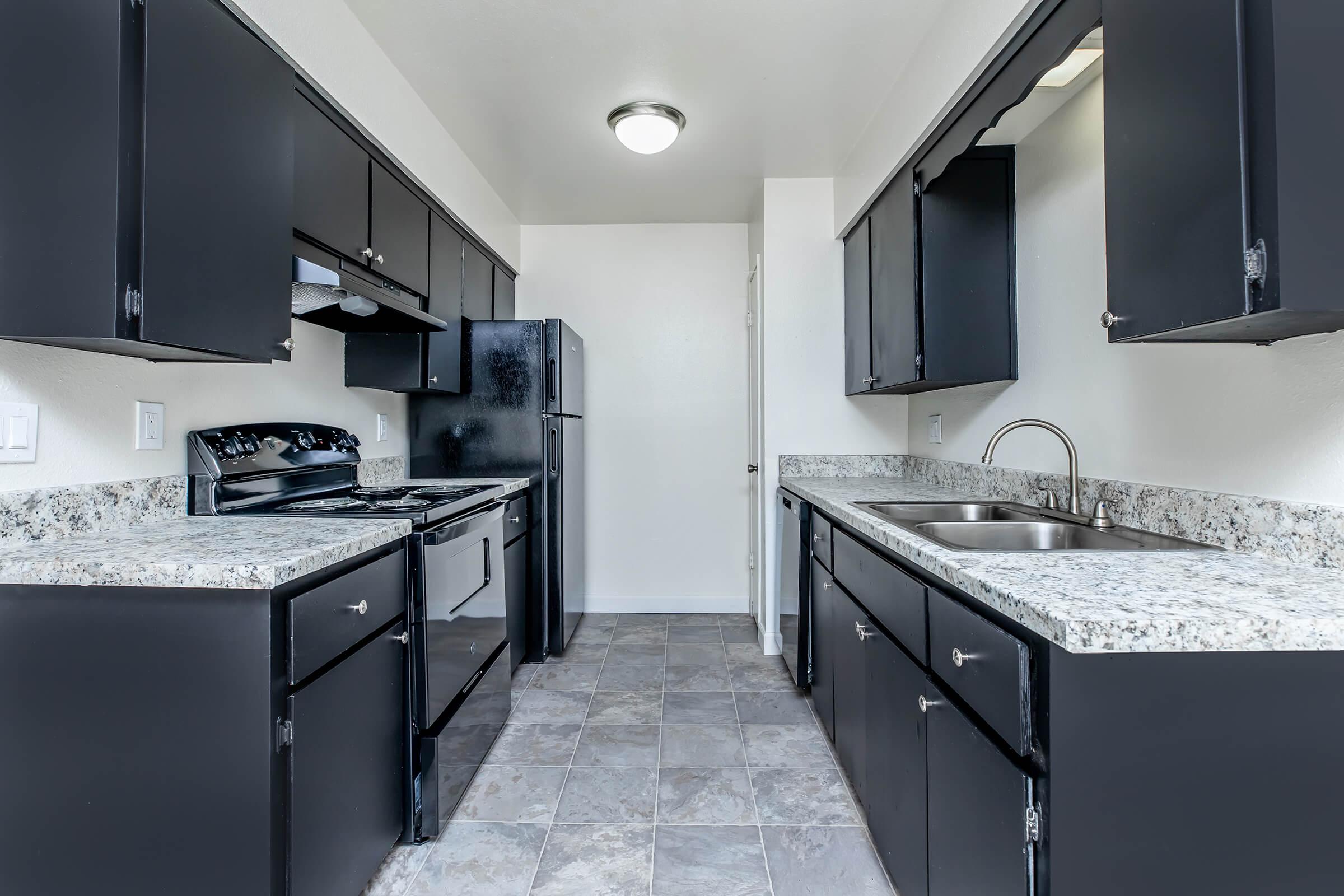 a modern kitchen with stainless steel appliances