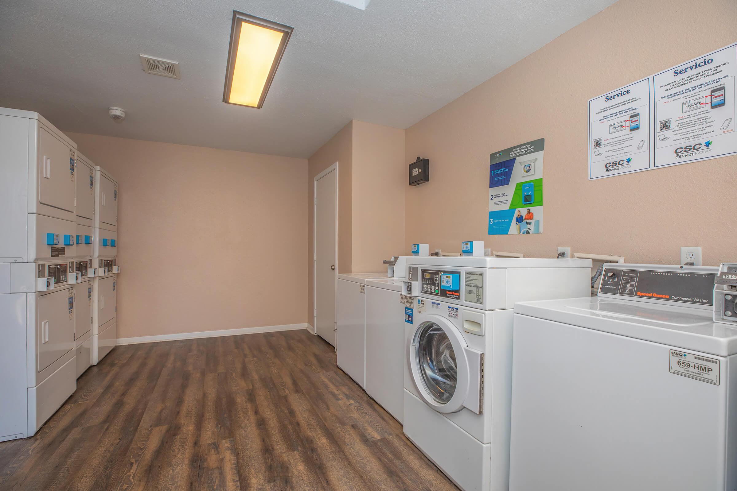 a kitchen with a sink and a refrigerator
