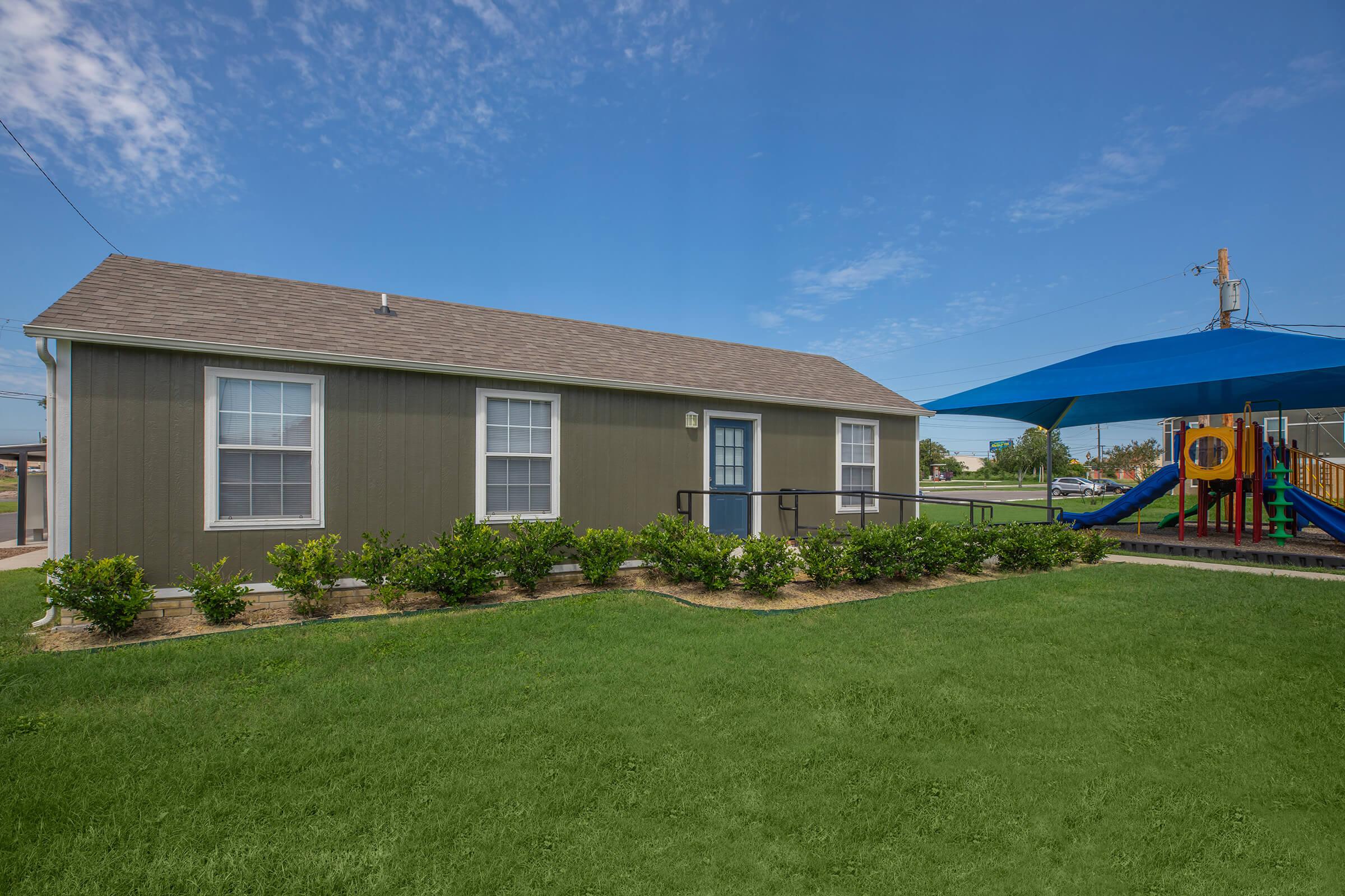 a large lawn in front of a house