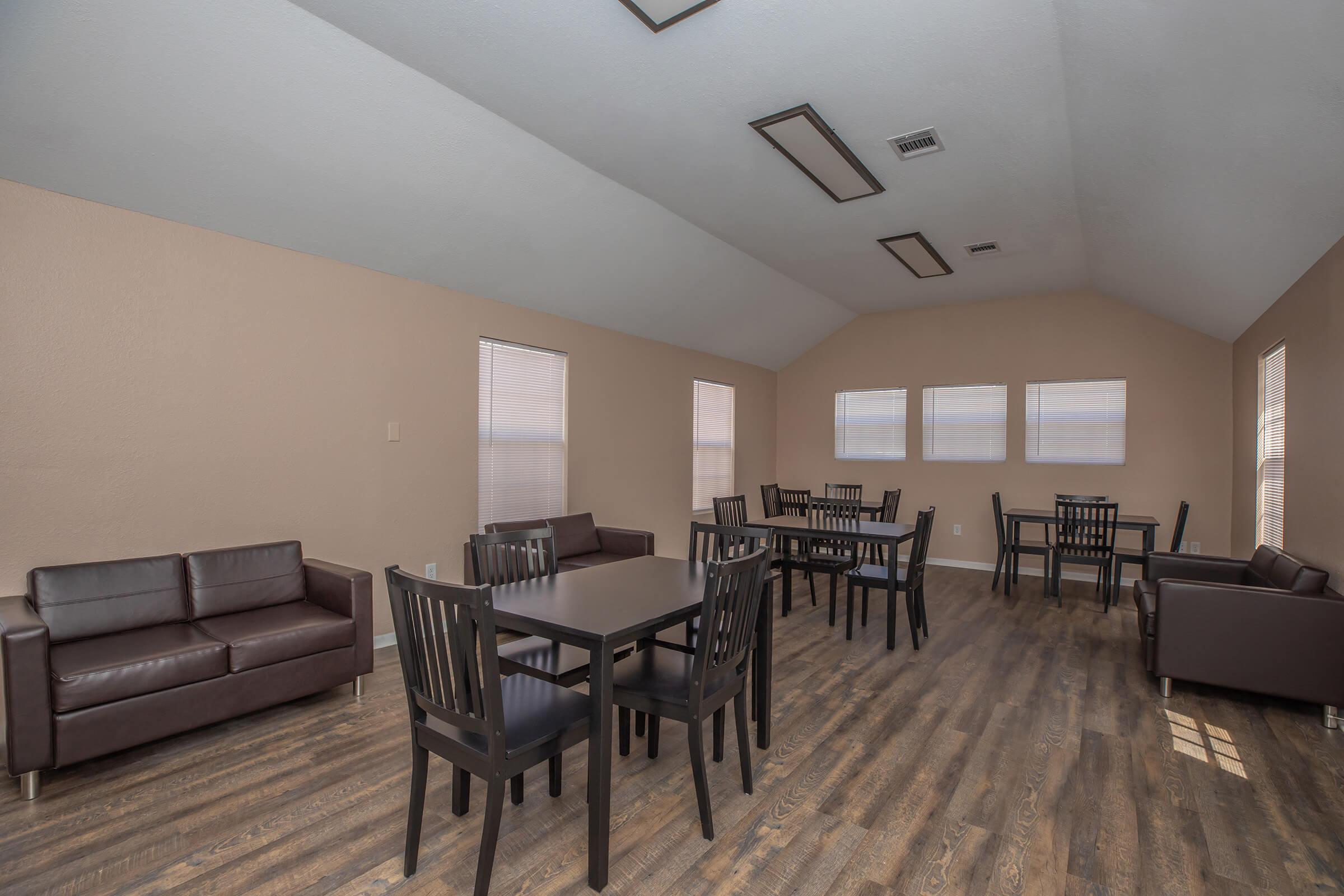 a room filled with furniture on top of a wooden chair