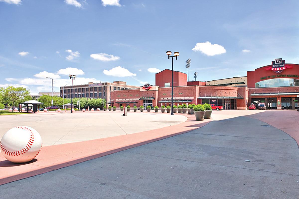 an empty parking lot in front of a building