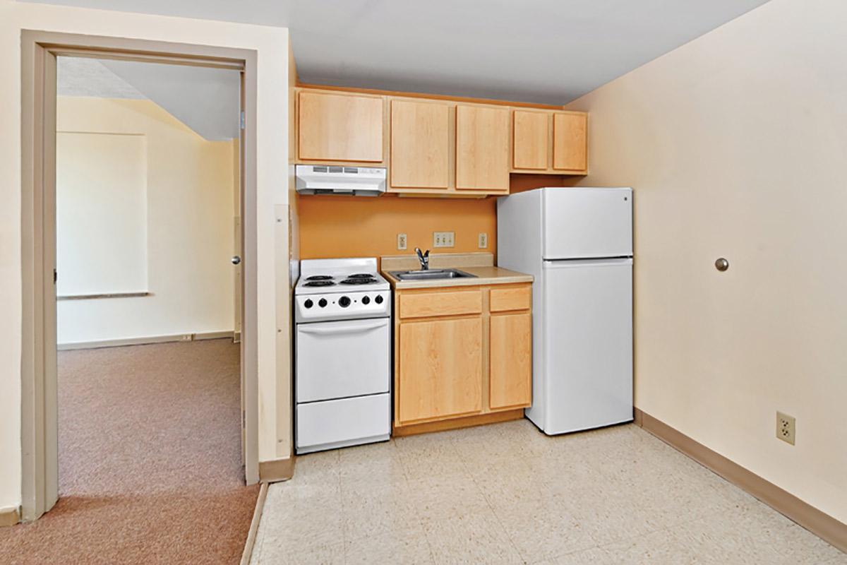 a kitchen with an open door