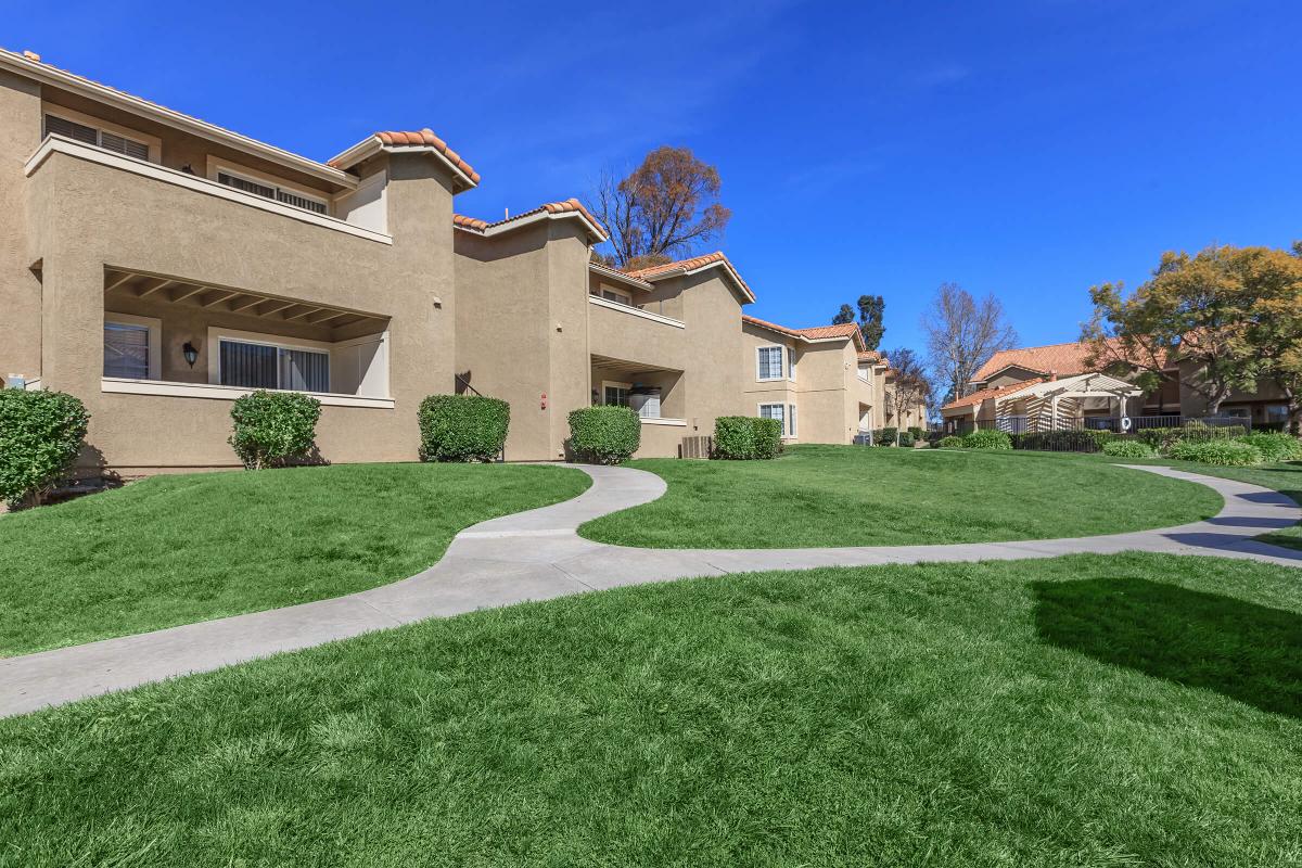 a large lawn in front of a house