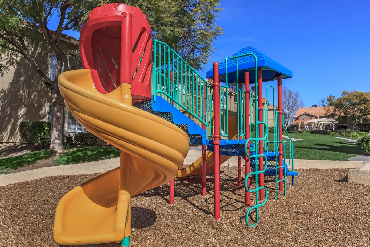 a chair sitting in front of a slide