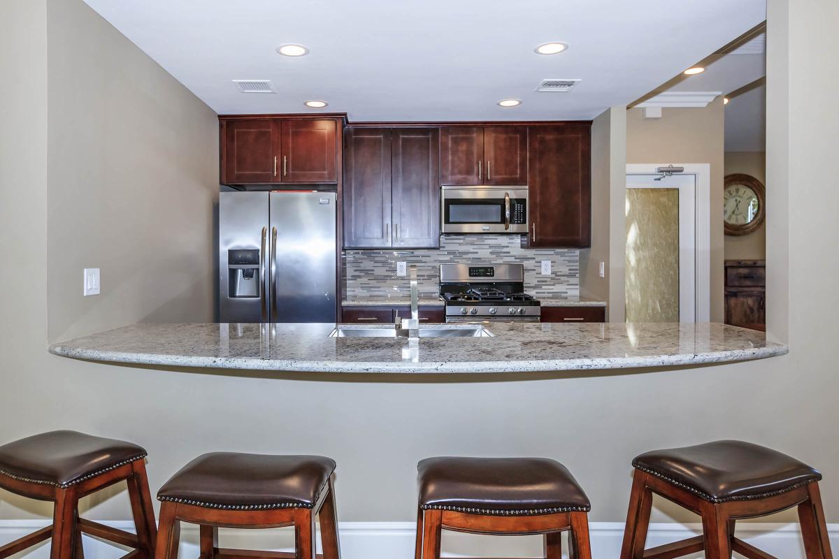 a kitchen with a dining room table