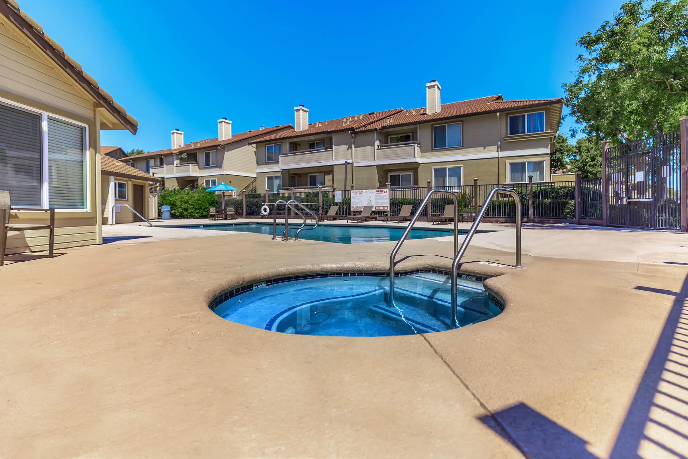 a pool next to a building