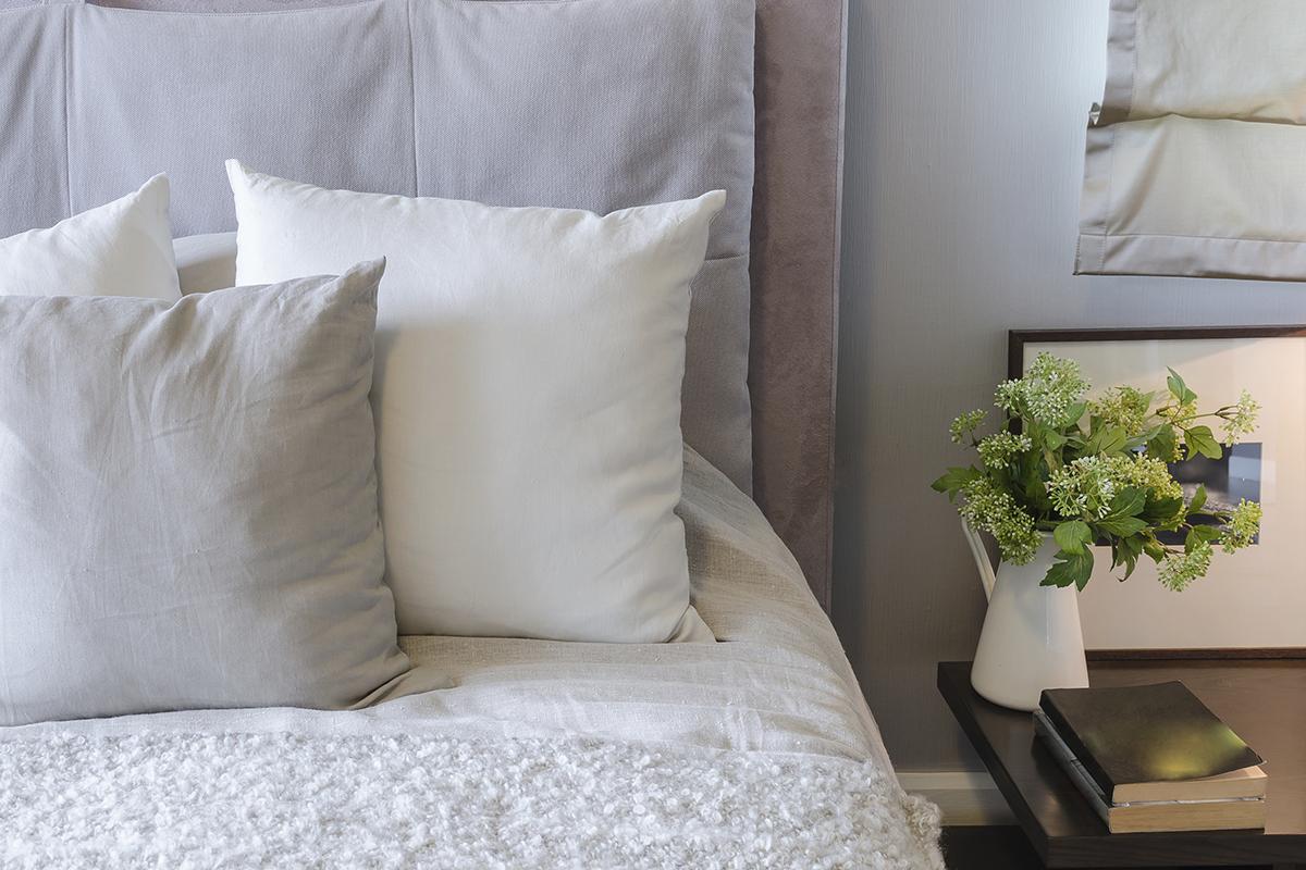 white pillows on white bed.jpg