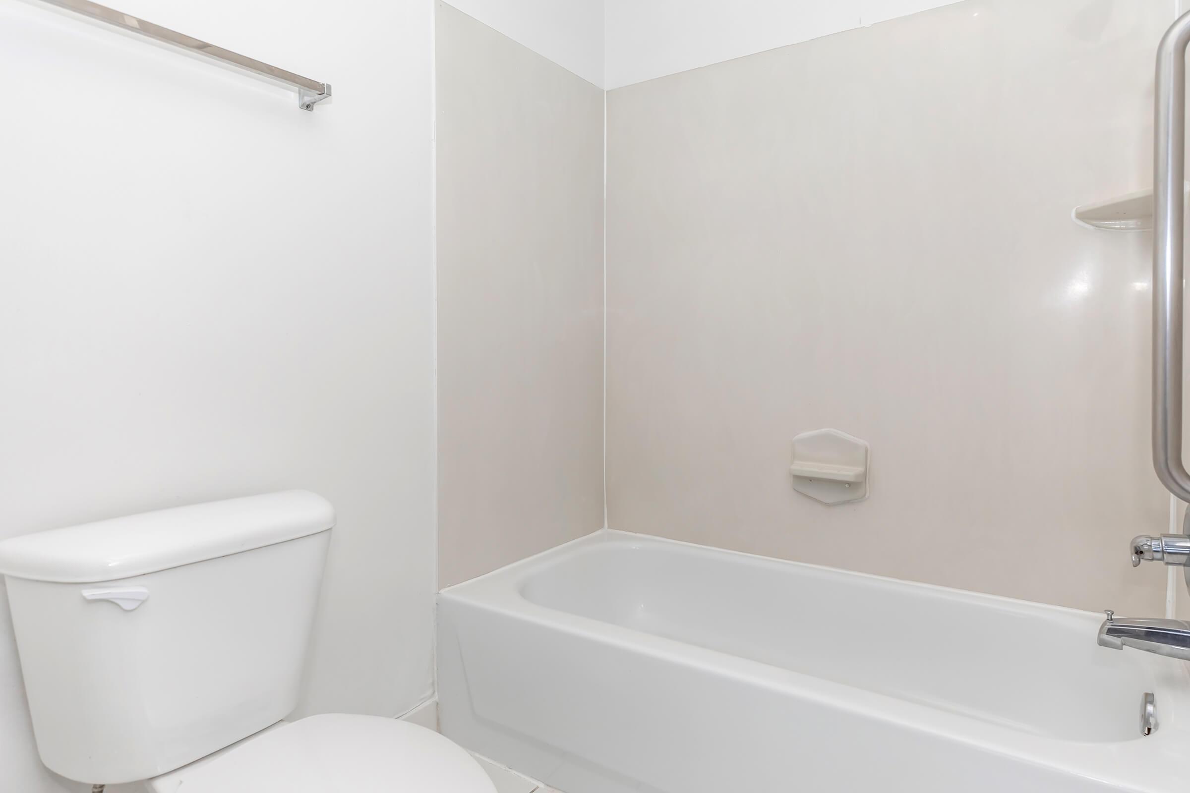 a room with a sink and a bath tub