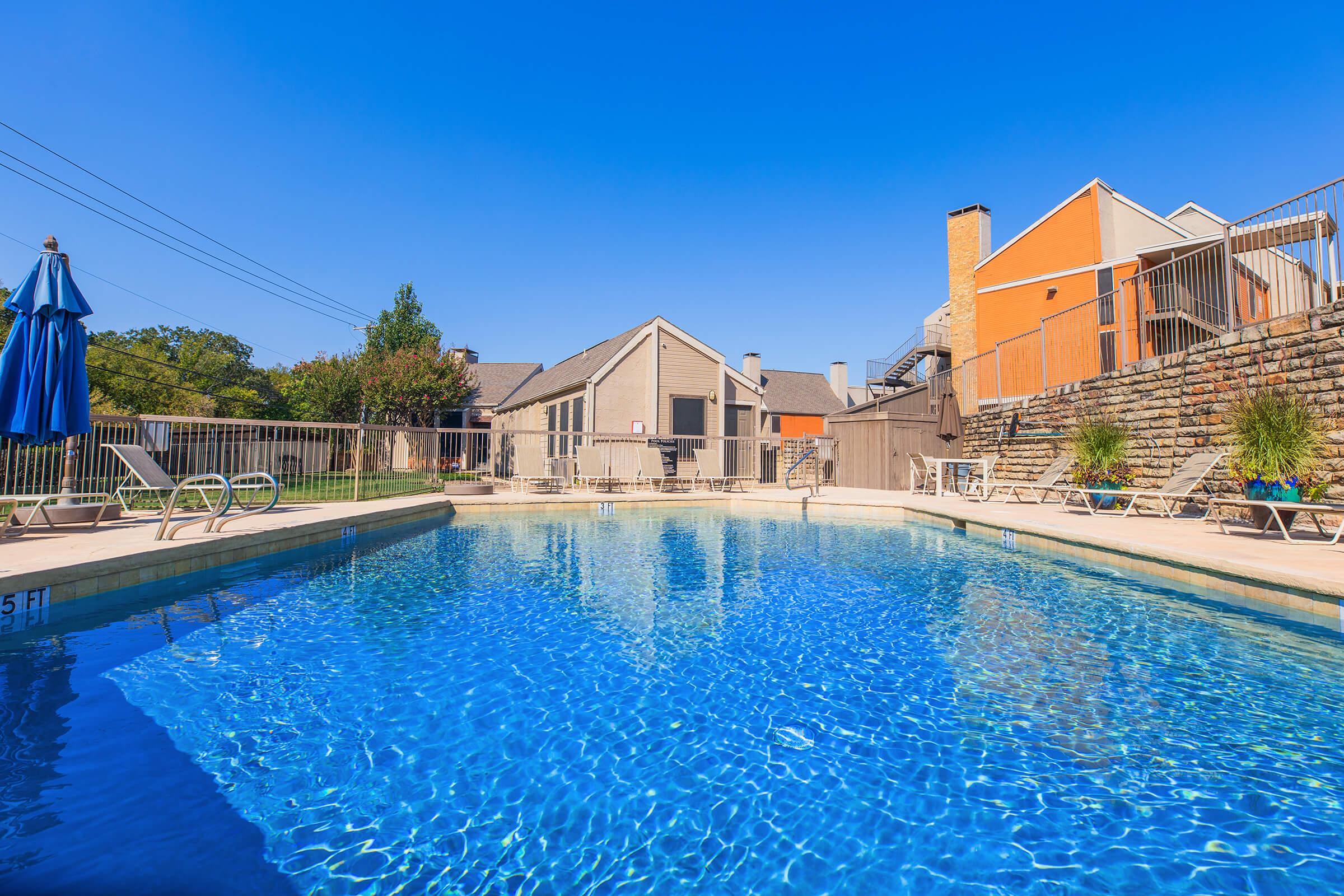 a pool next to a body of water