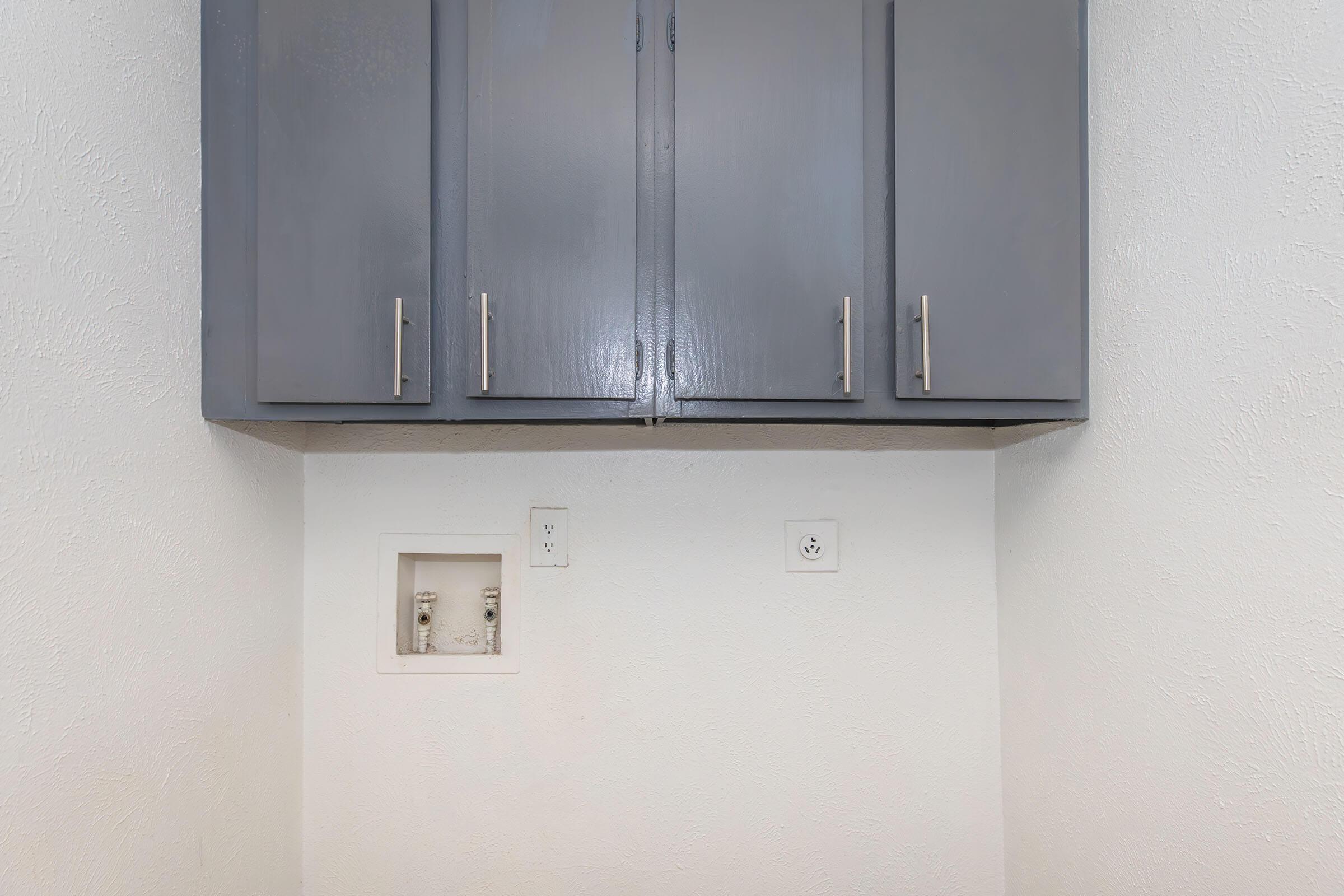 a refrigerator freezer sitting in a room