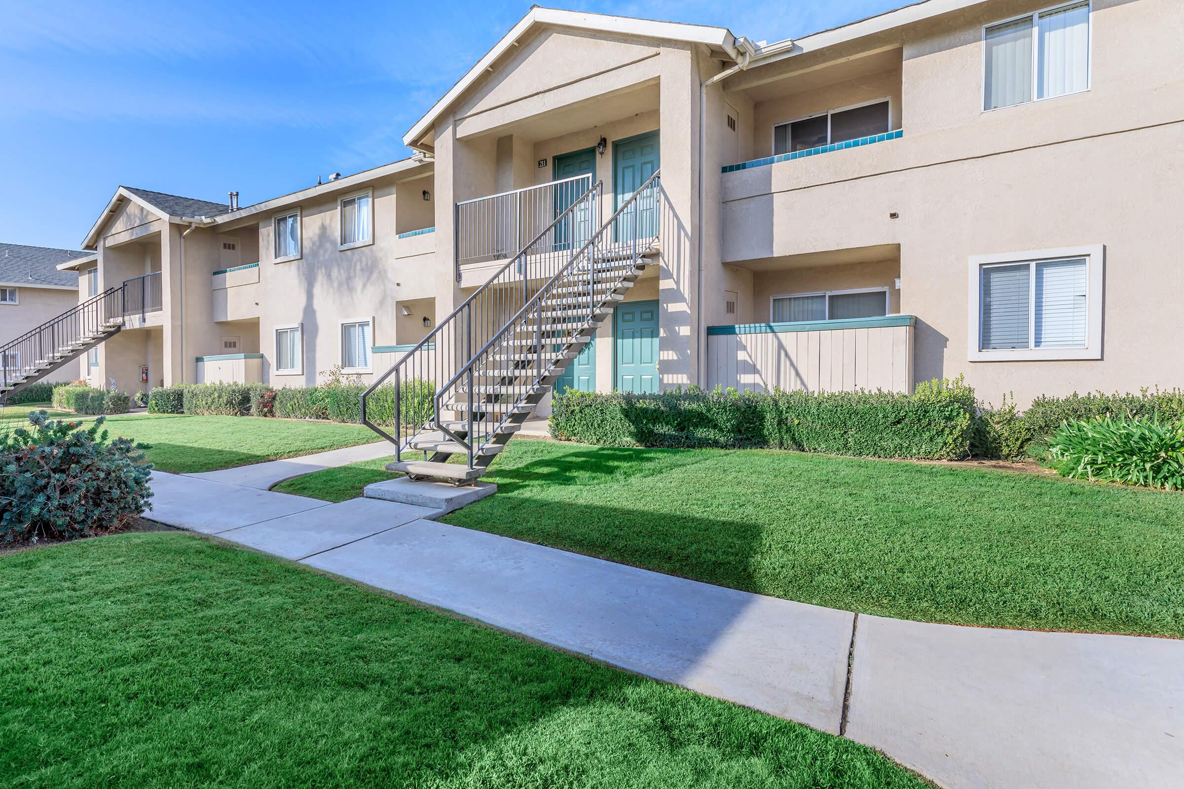 a large lawn in front of a house