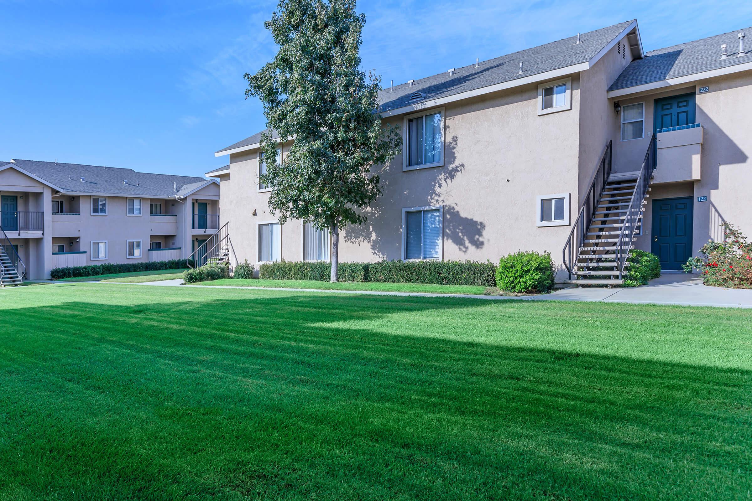 a large lawn in front of a house