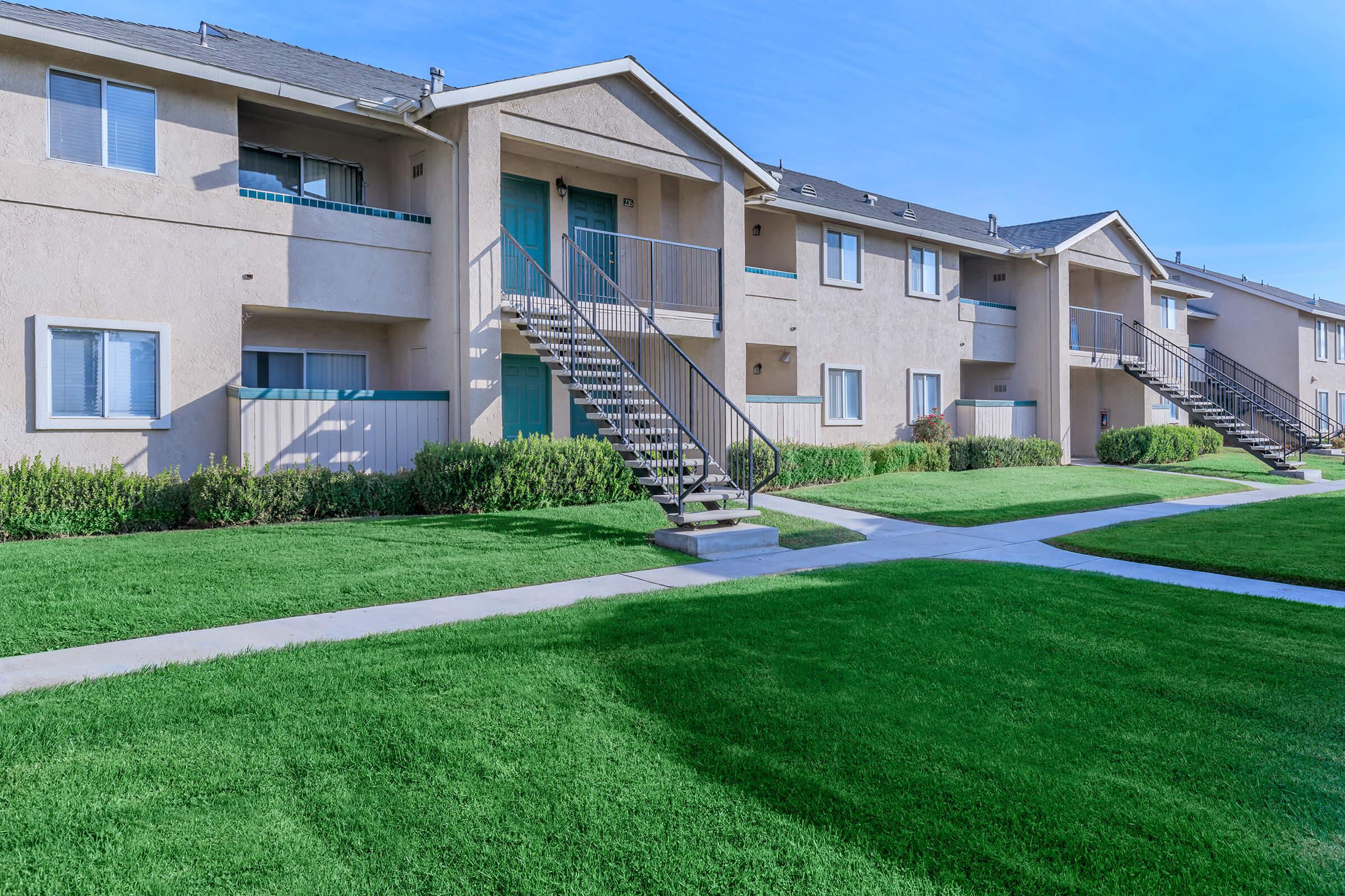 a large lawn in front of a house