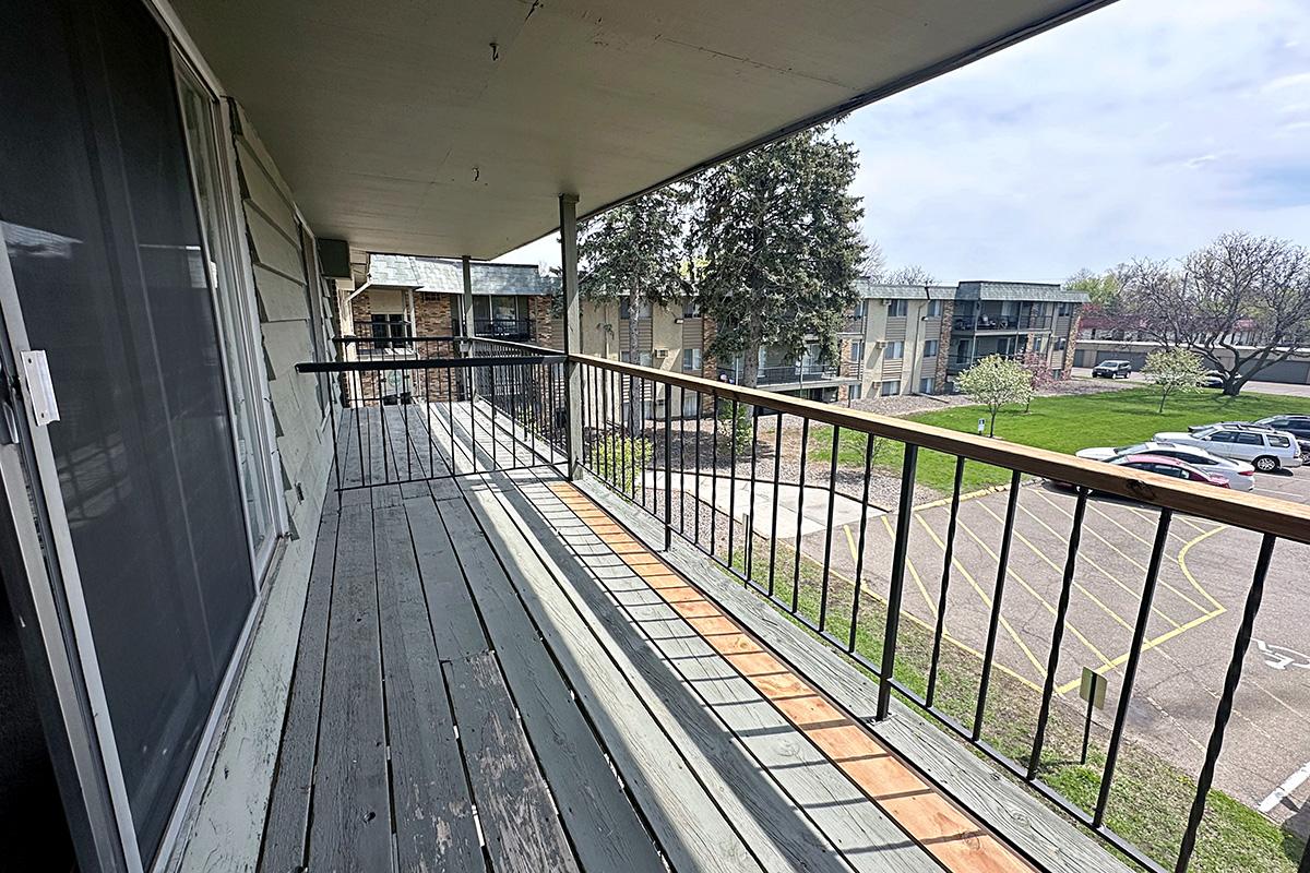 a building with a metal fence