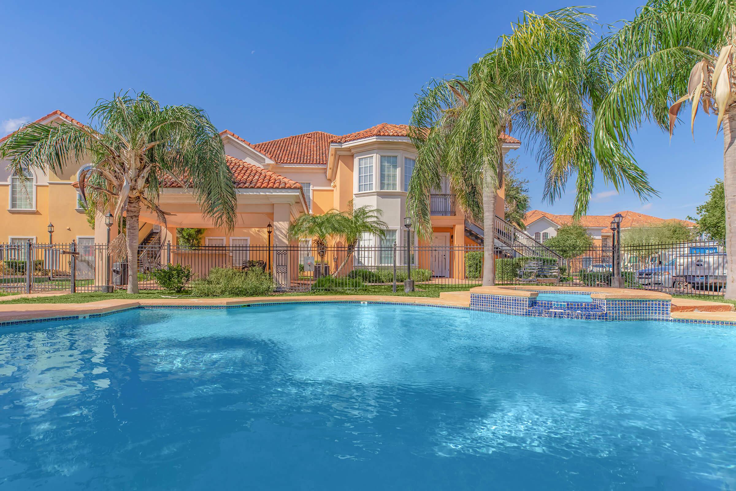 a large pool of water in front of a building