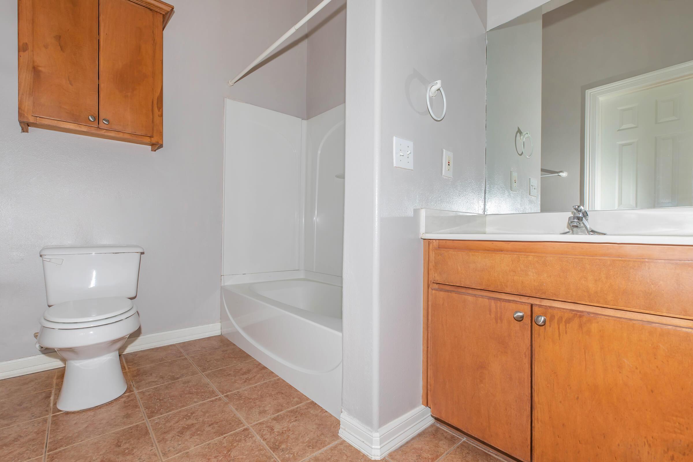 a kitchen with a sink and a refrigerator