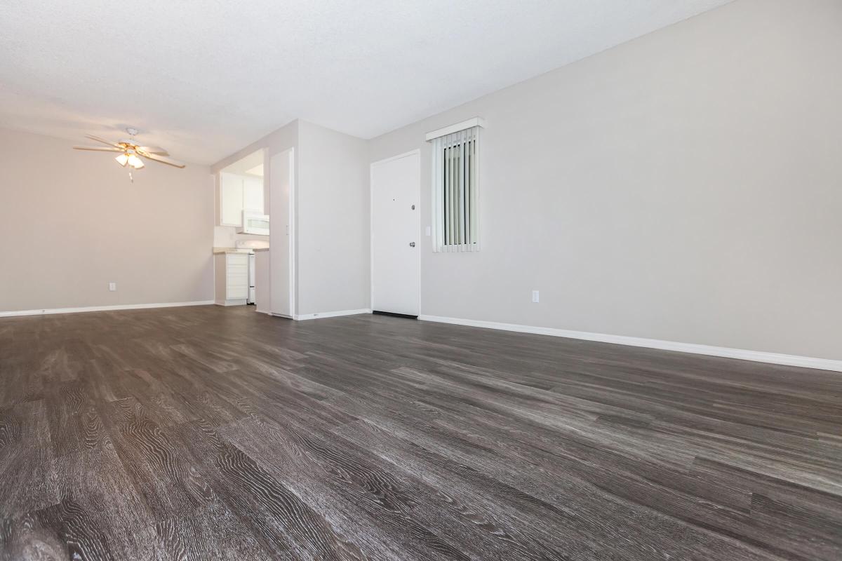 Living room and dining room with wooden floors