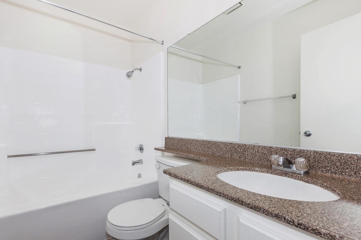 Bathroom with white cabinets