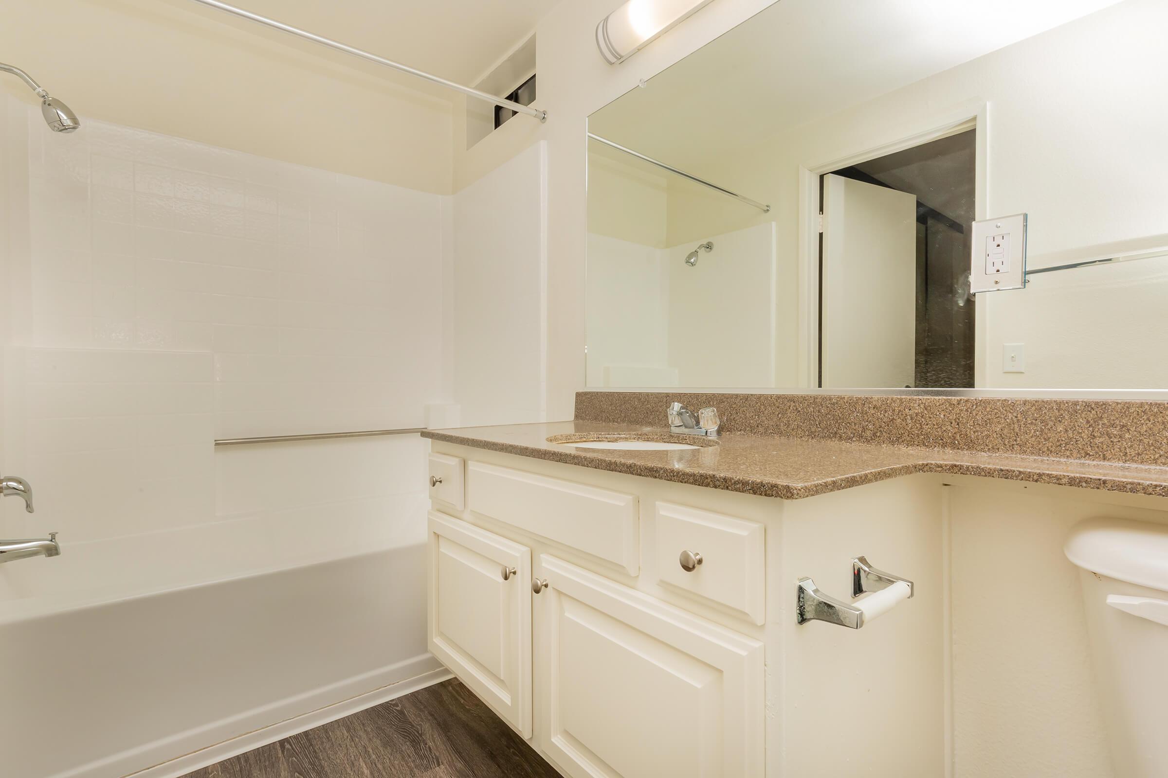 Unfurnished bathroom with wooden floors