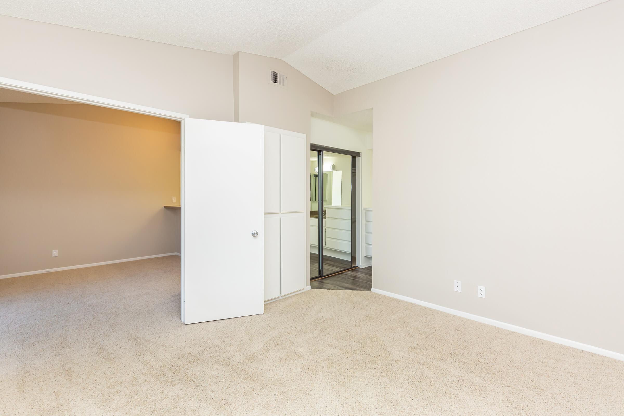 Unfurnished bedroom with carpet