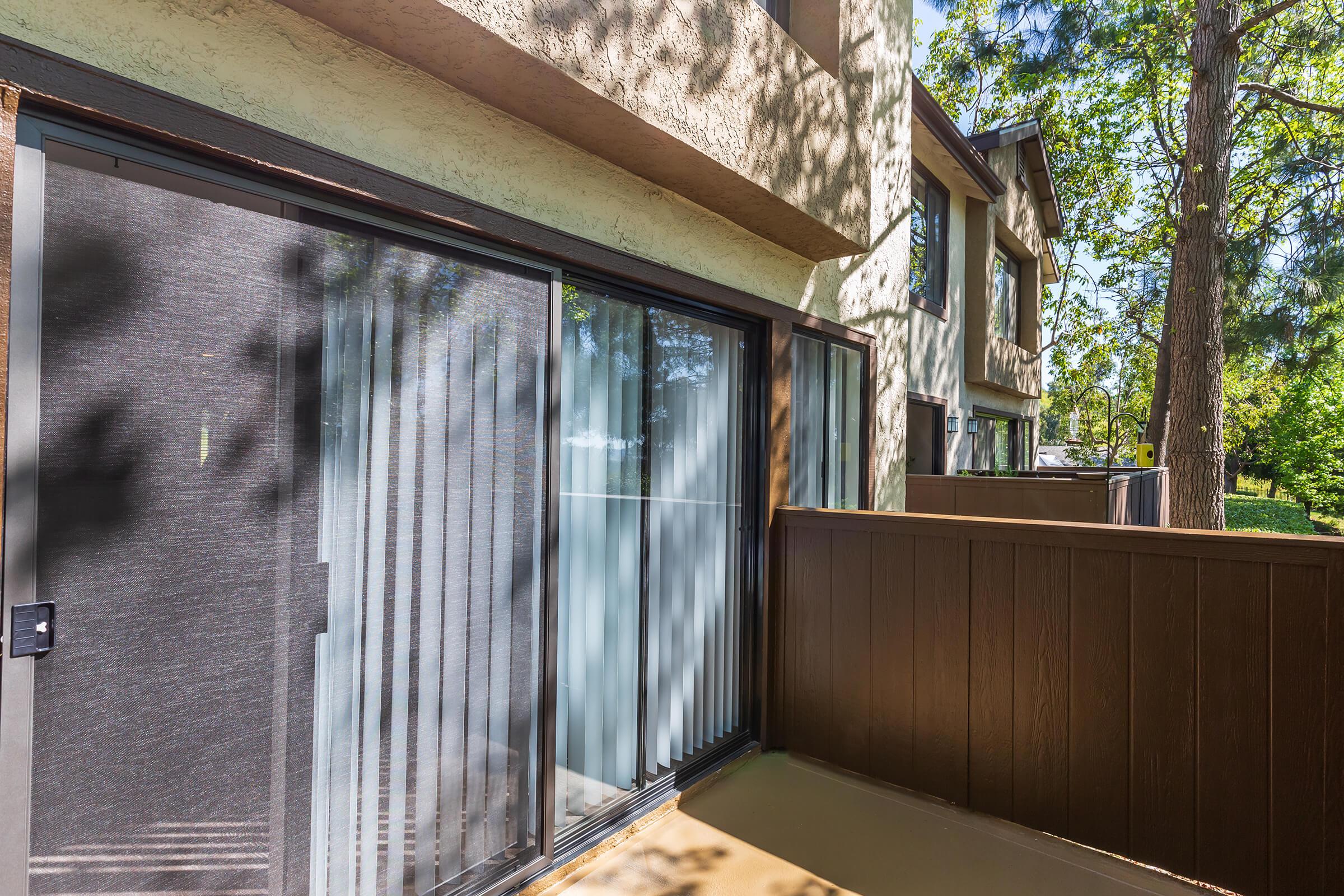 Unfurnished patio with sliding glass doors