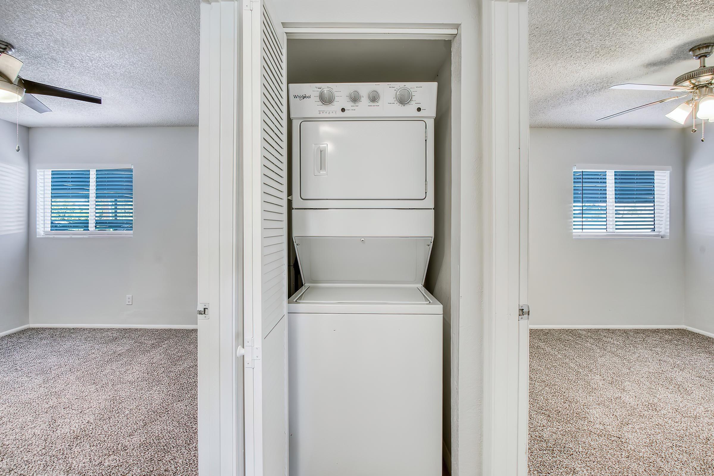 a refrigerator freezer sitting in a room