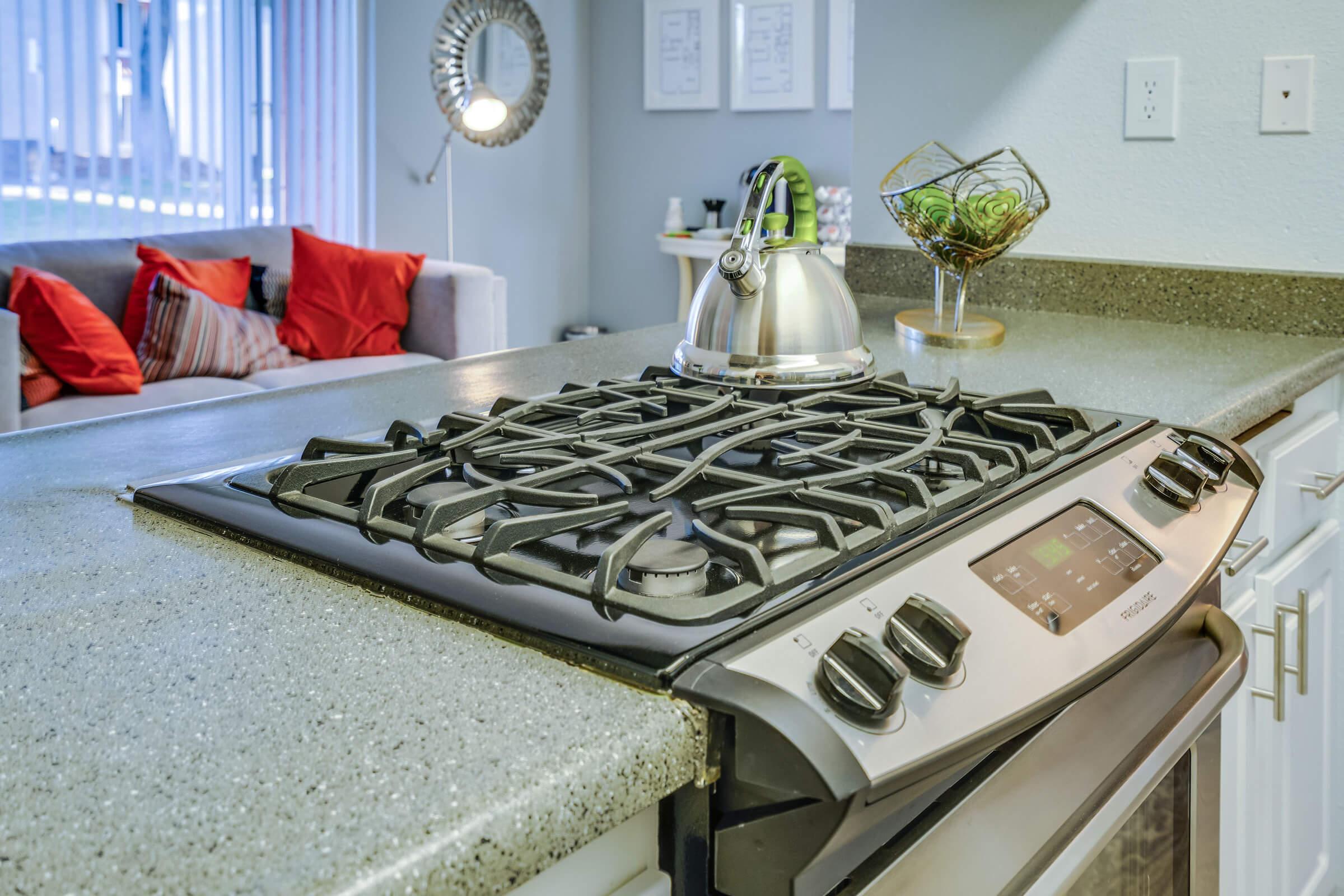 a stove top oven sitting inside of a room