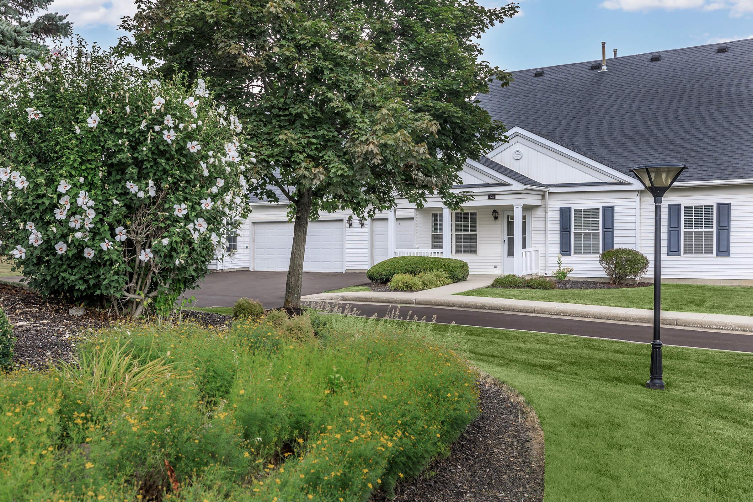 a large lawn in front of a house