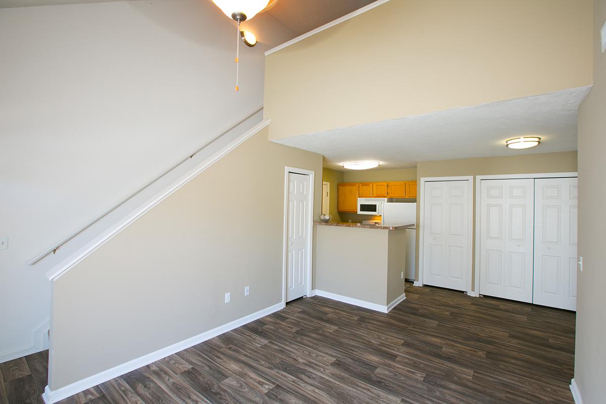 a kitchen with a wood floor