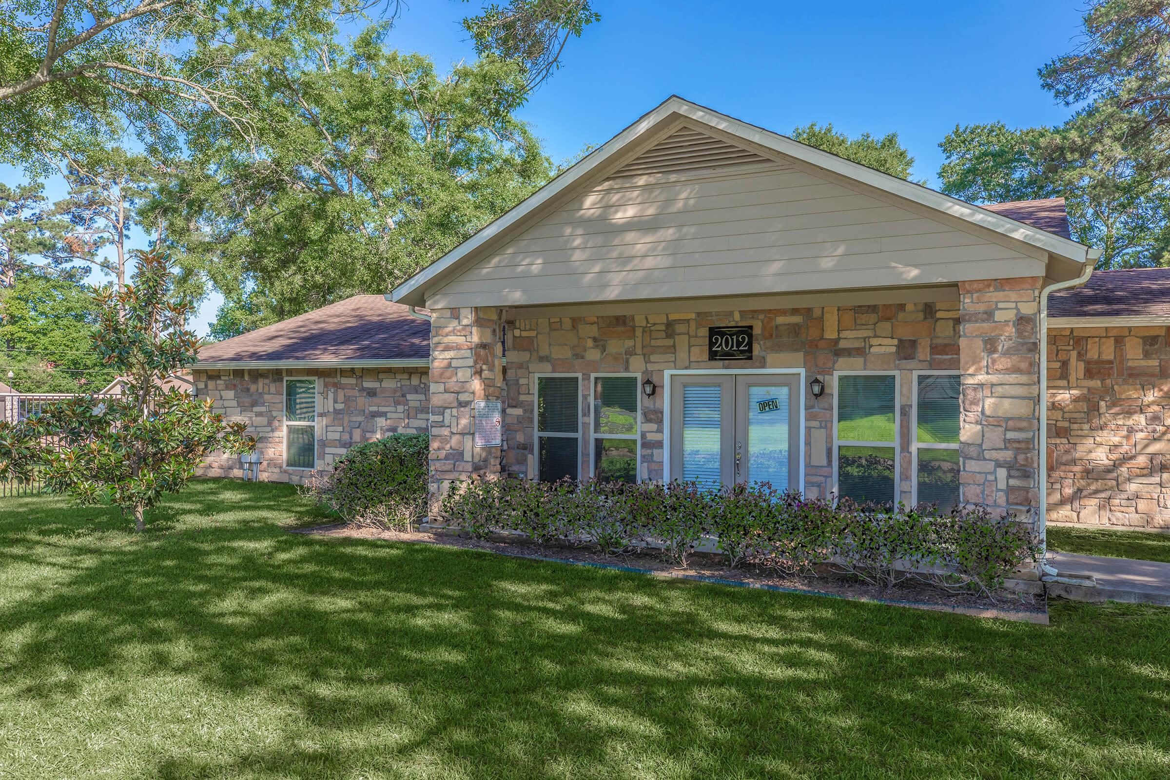 a large lawn in front of a house