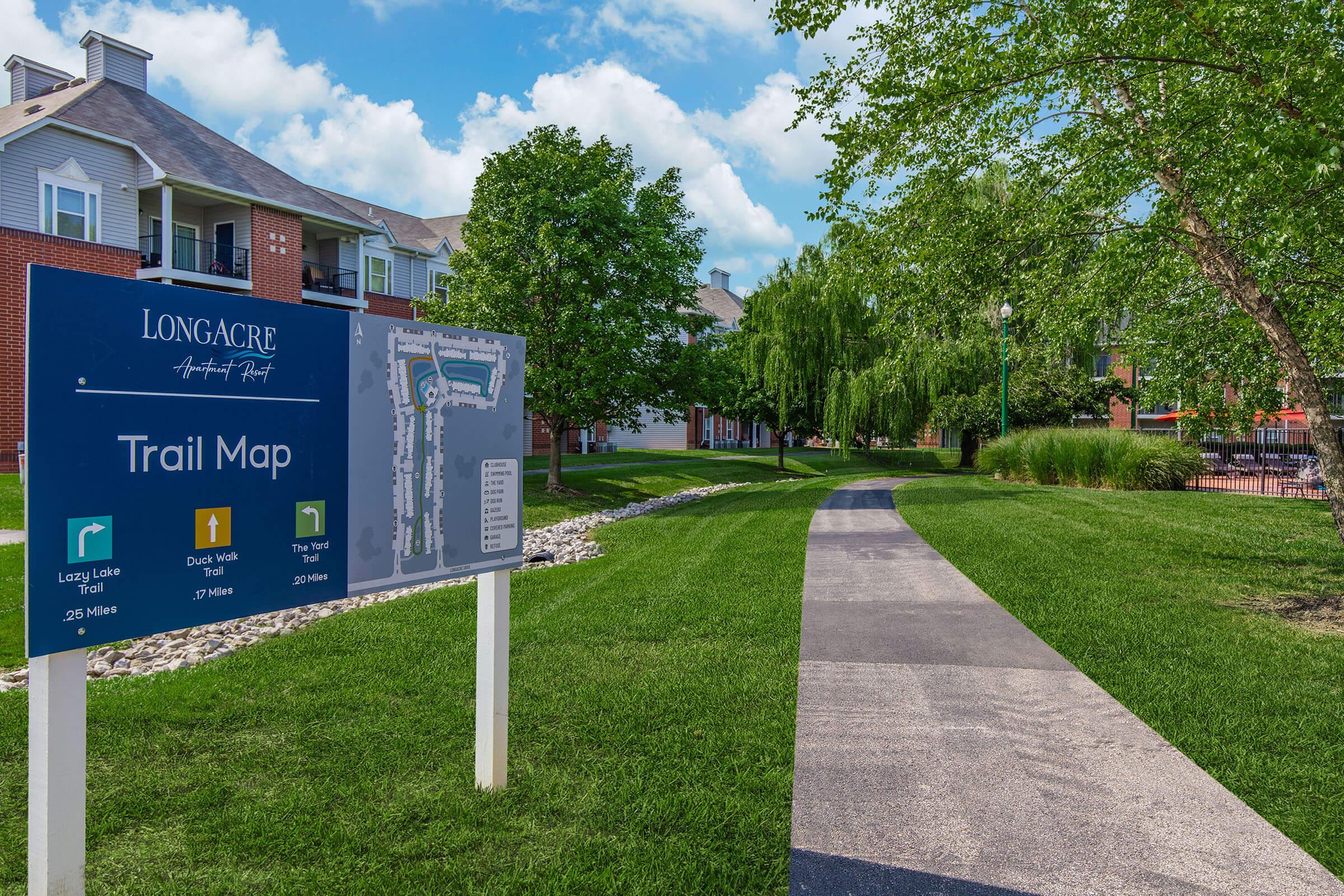 a sign in front of a house