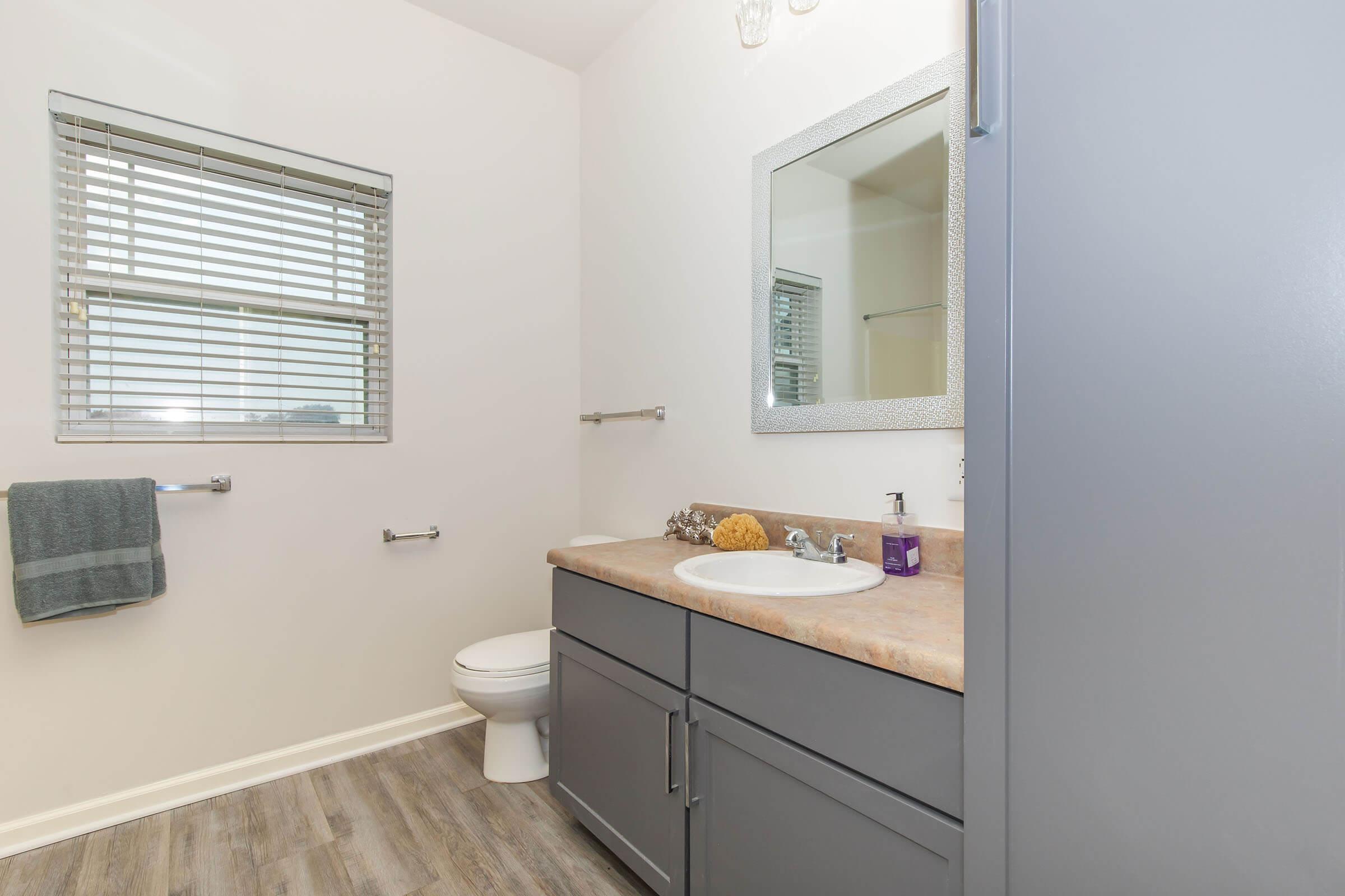 a kitchen with a sink and a window