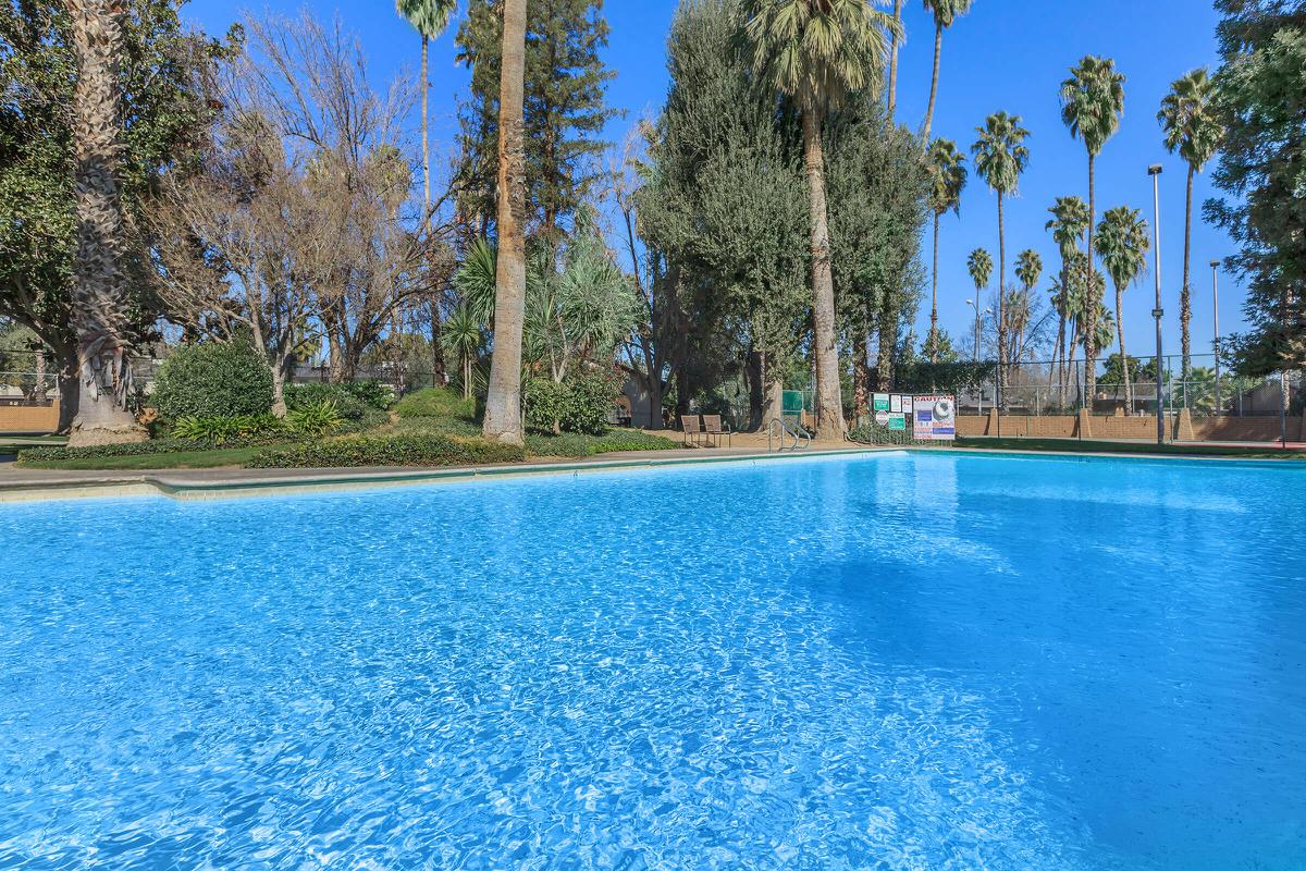 a pool next to a body of water