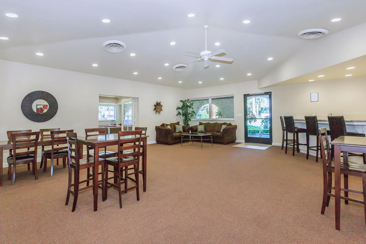 a room filled with furniture and a table