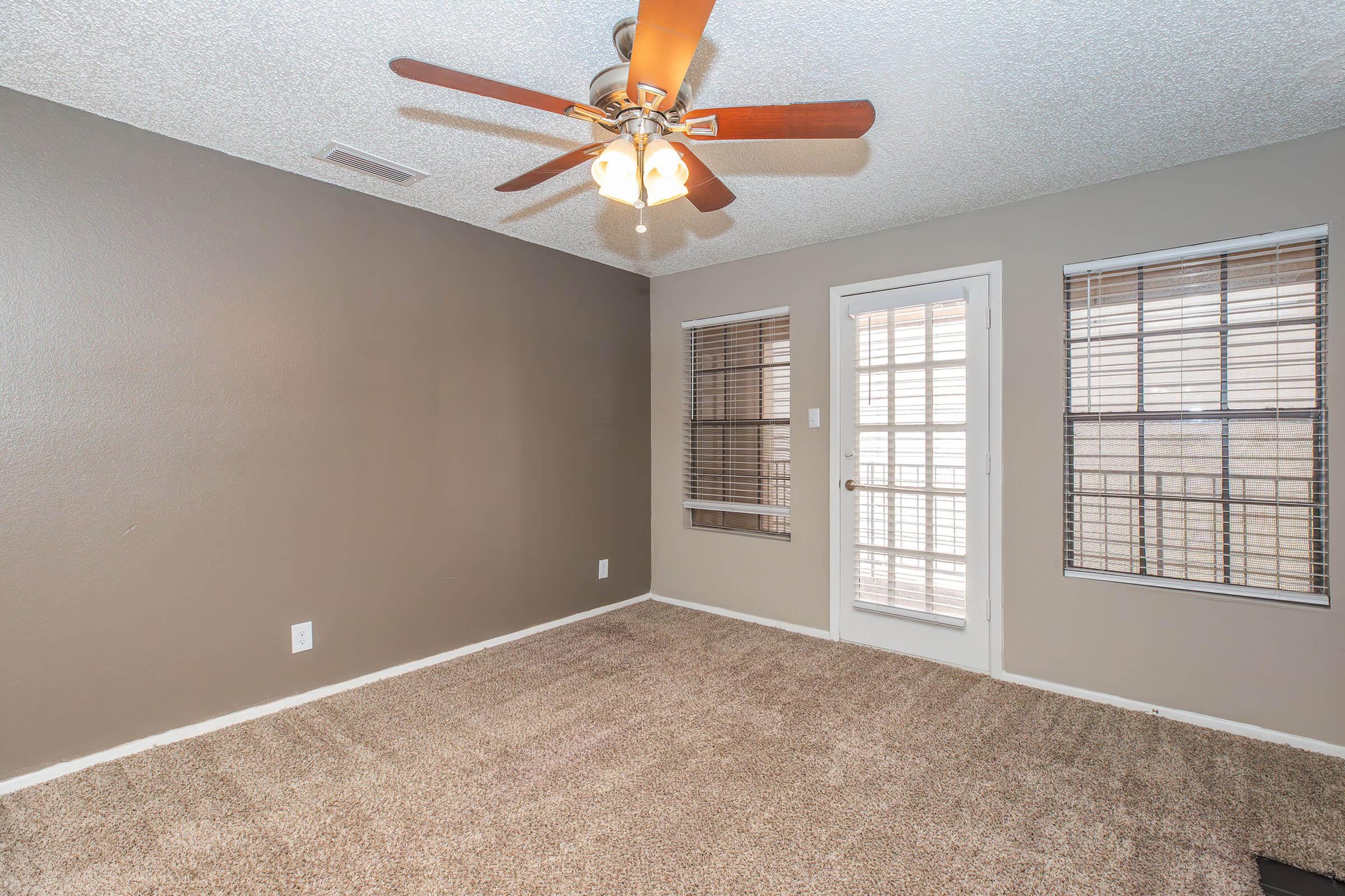 a bedroom with a large window