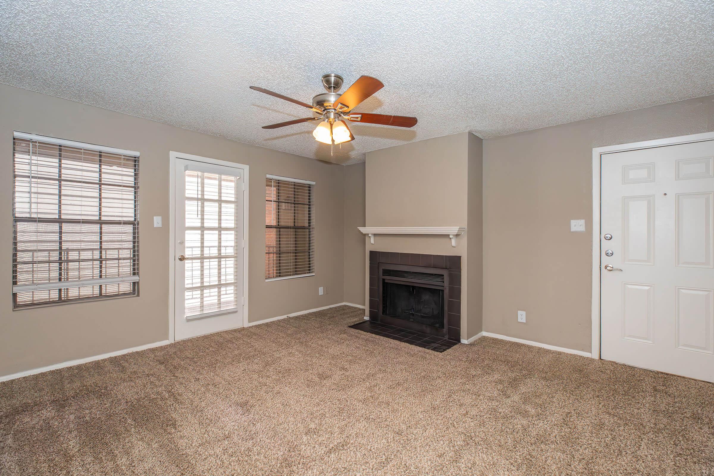 a bedroom with a large window