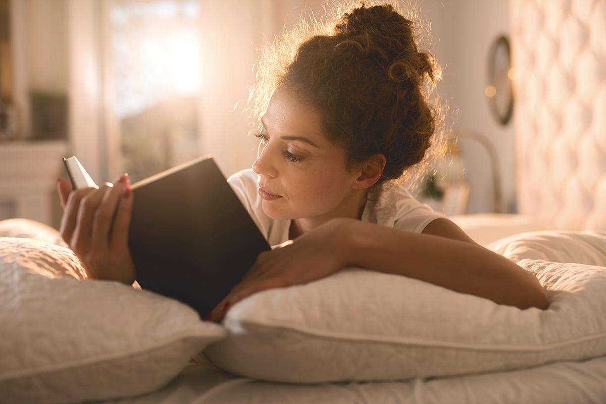 a person sitting on a bed