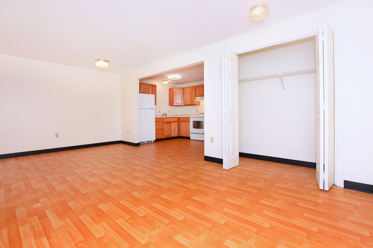 a kitchen with a wooden floor