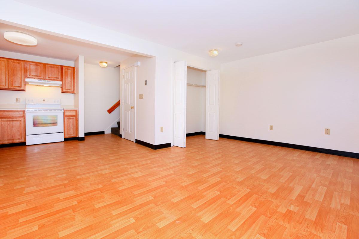 a kitchen with a wood floor